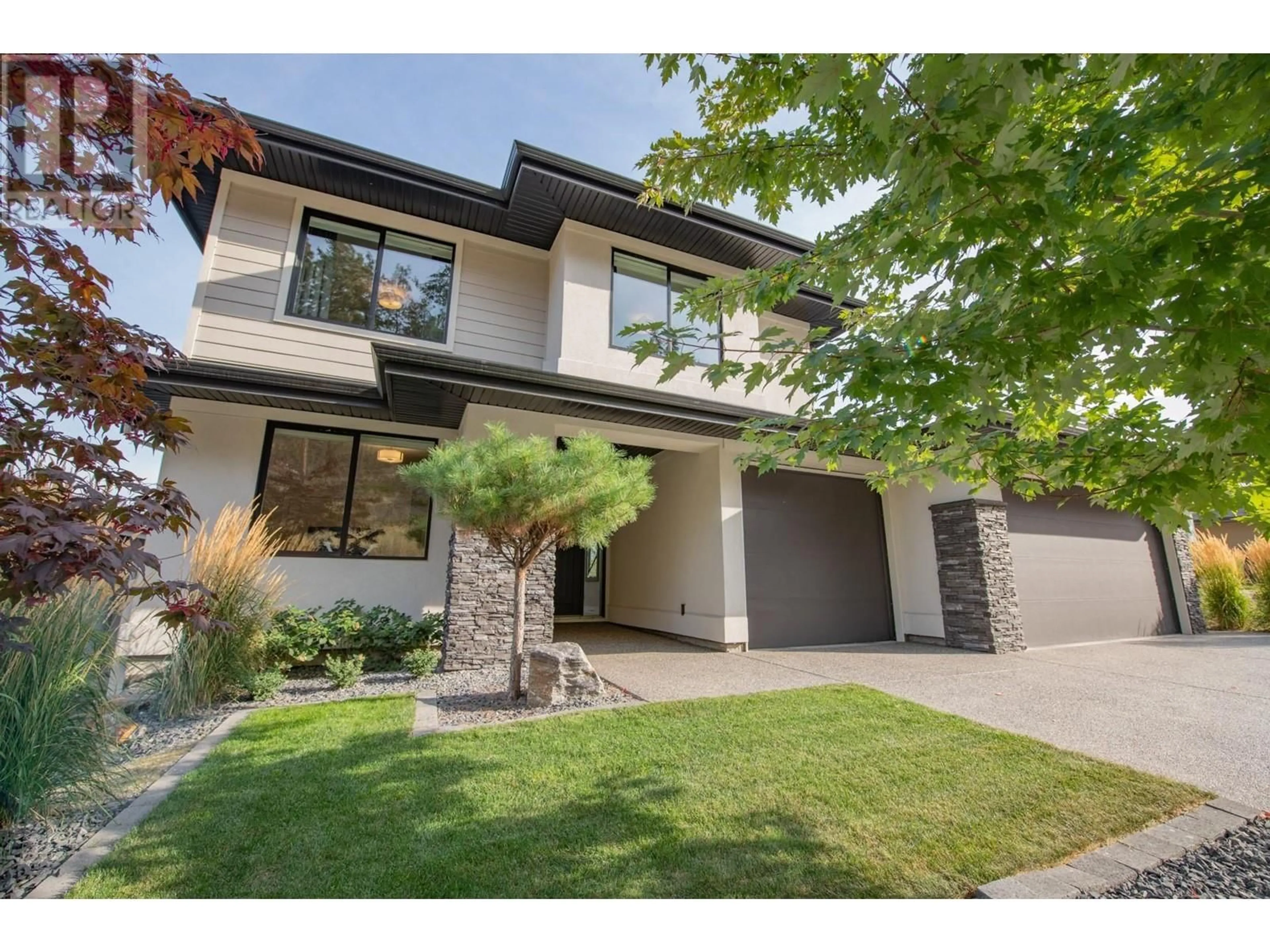 Frontside or backside of a home, the street view for 139 Forest Edge Place, Kelowna British Columbia V1V3G3