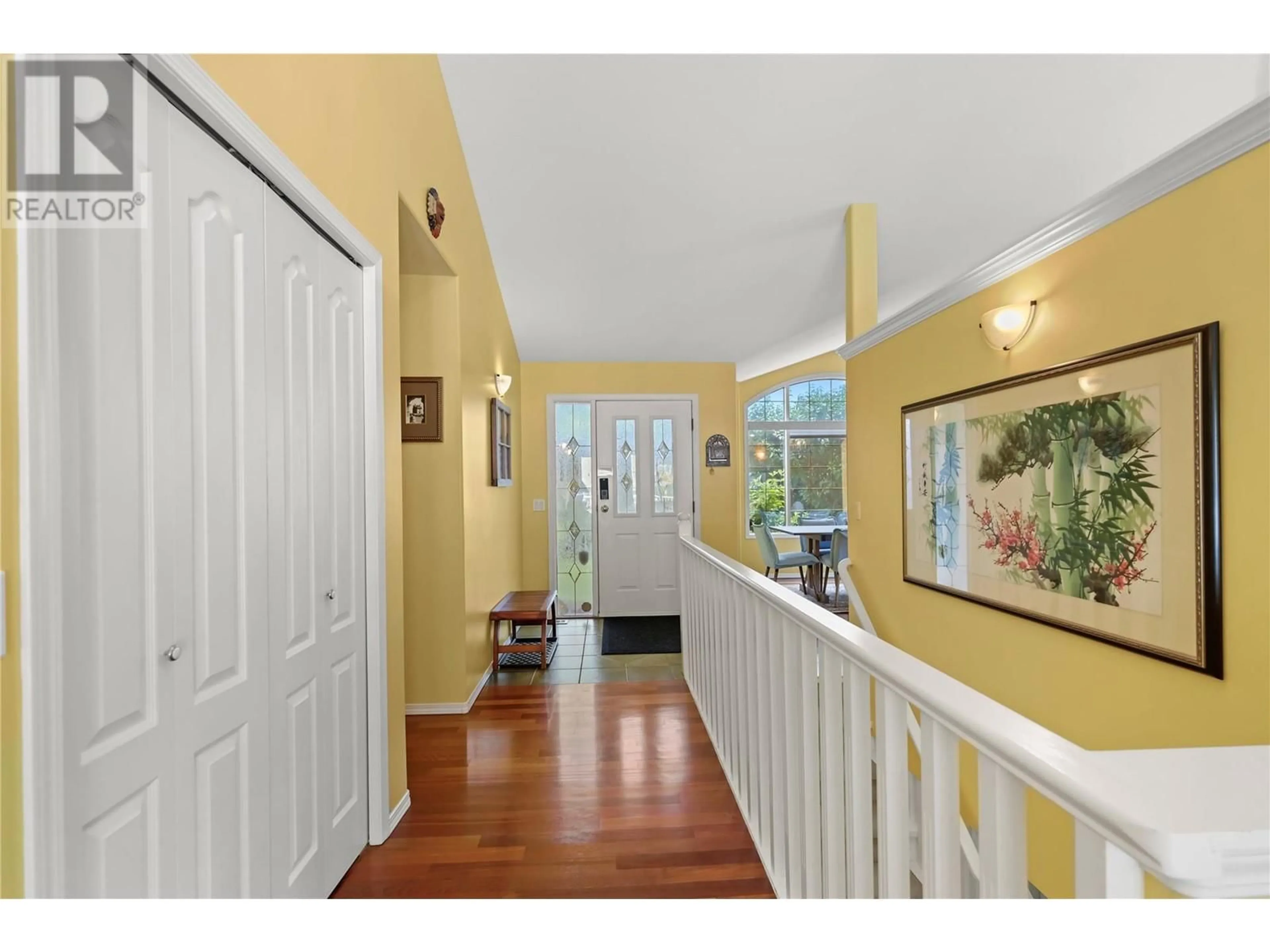 Indoor entryway, wood floors for 773 Siwash Court, Kelowna British Columbia V1V1N5