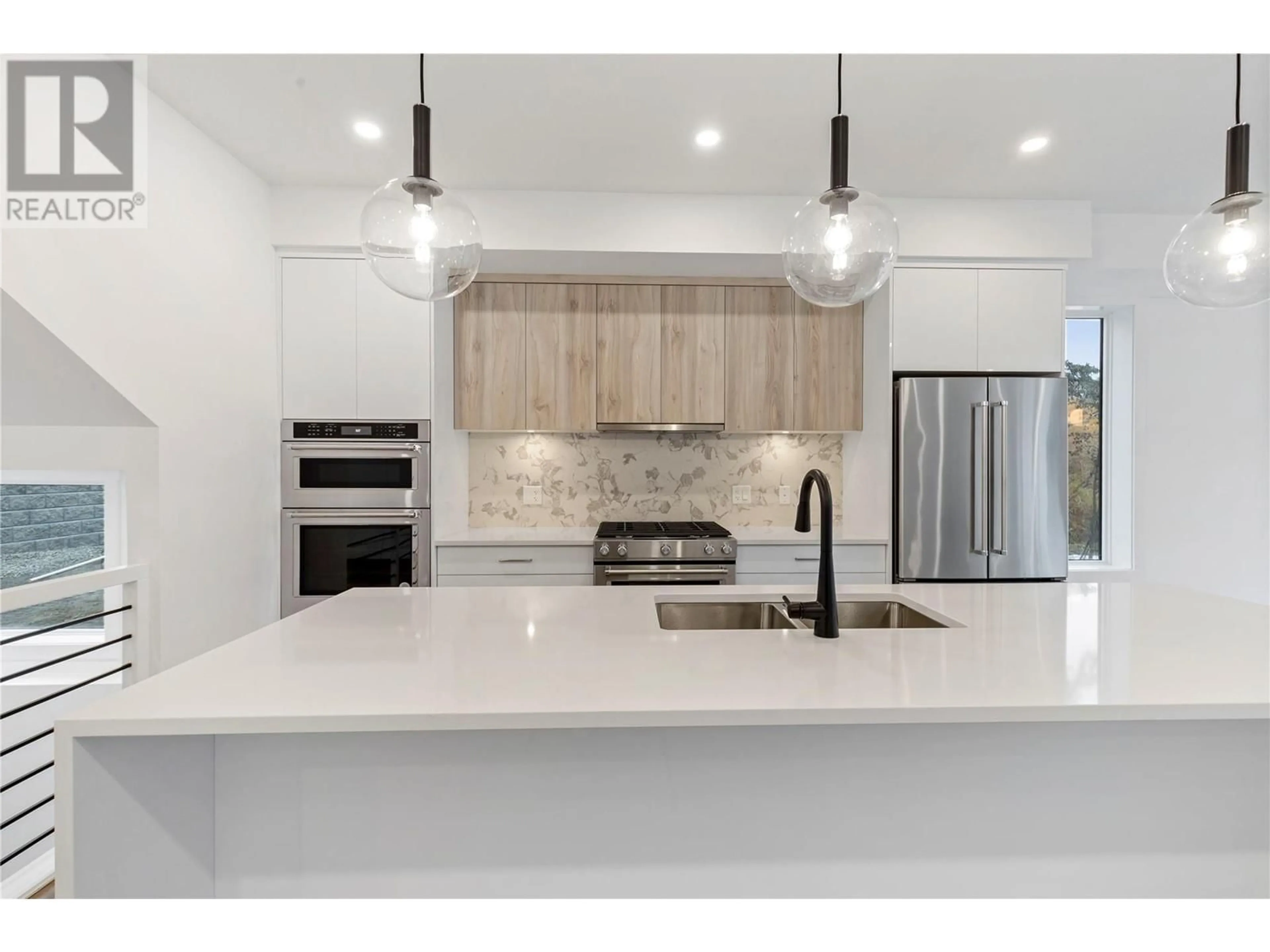 Open concept kitchen, ceramic/tile floor for 210 - 2735 SHANNON LAKE ROAD, West Kelowna British Columbia V4T1V6