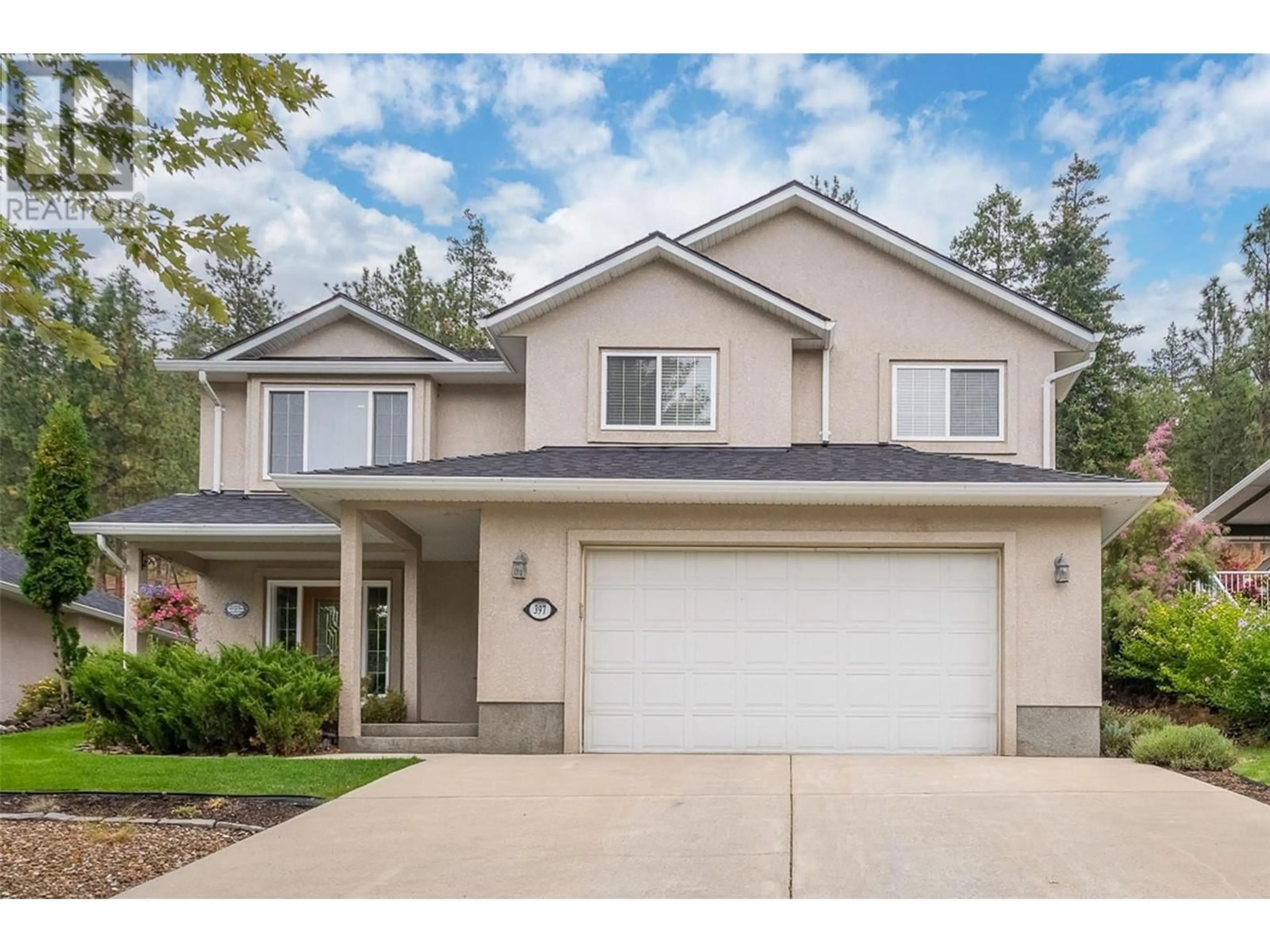 Frontside or backside of a home, cottage for 397 Rio Drive, Kelowna British Columbia V1V2L2