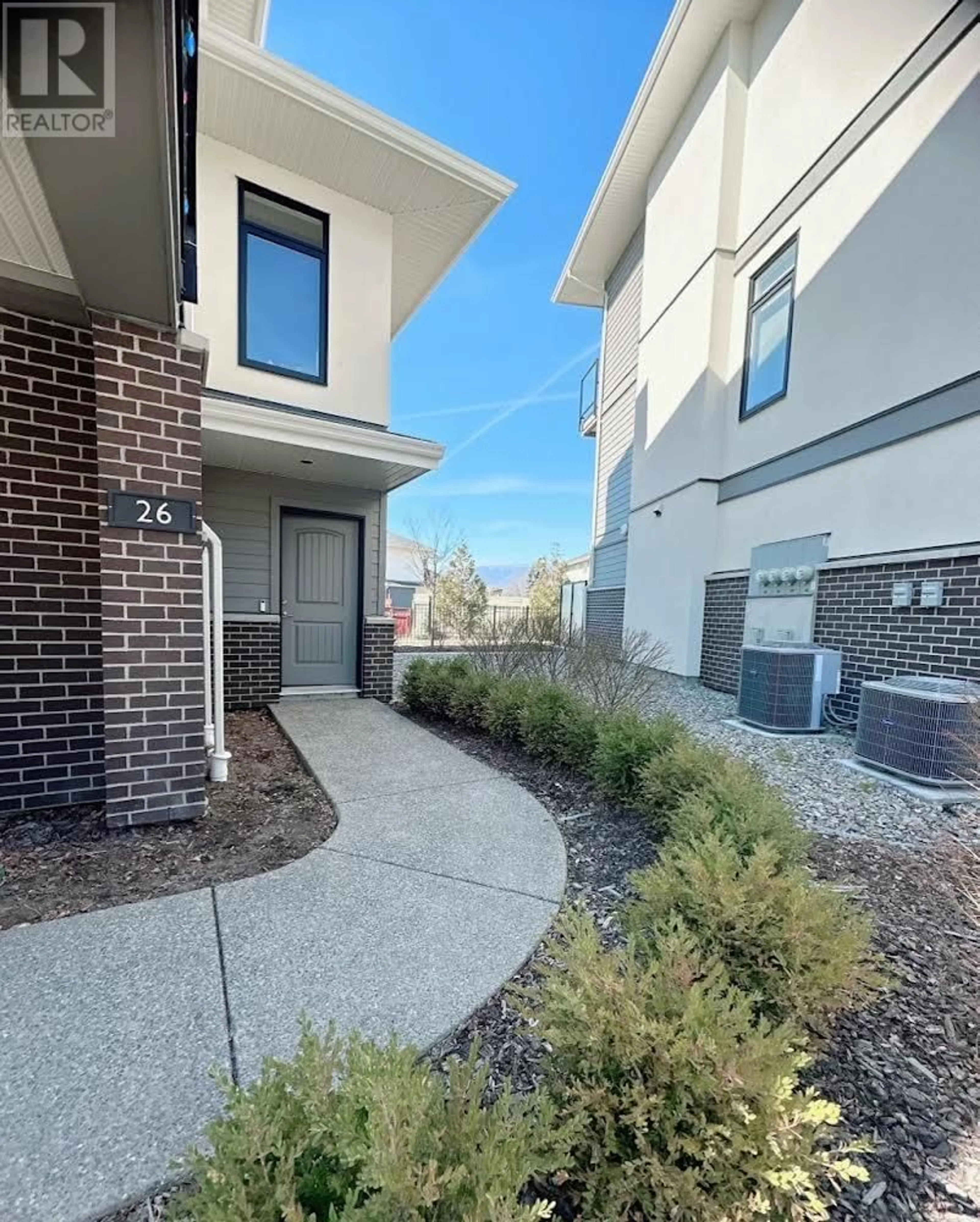 Home with brick exterior material, street for 26 - 1102 CAMERON AVENUE, Kelowna British Columbia V1Y0B2