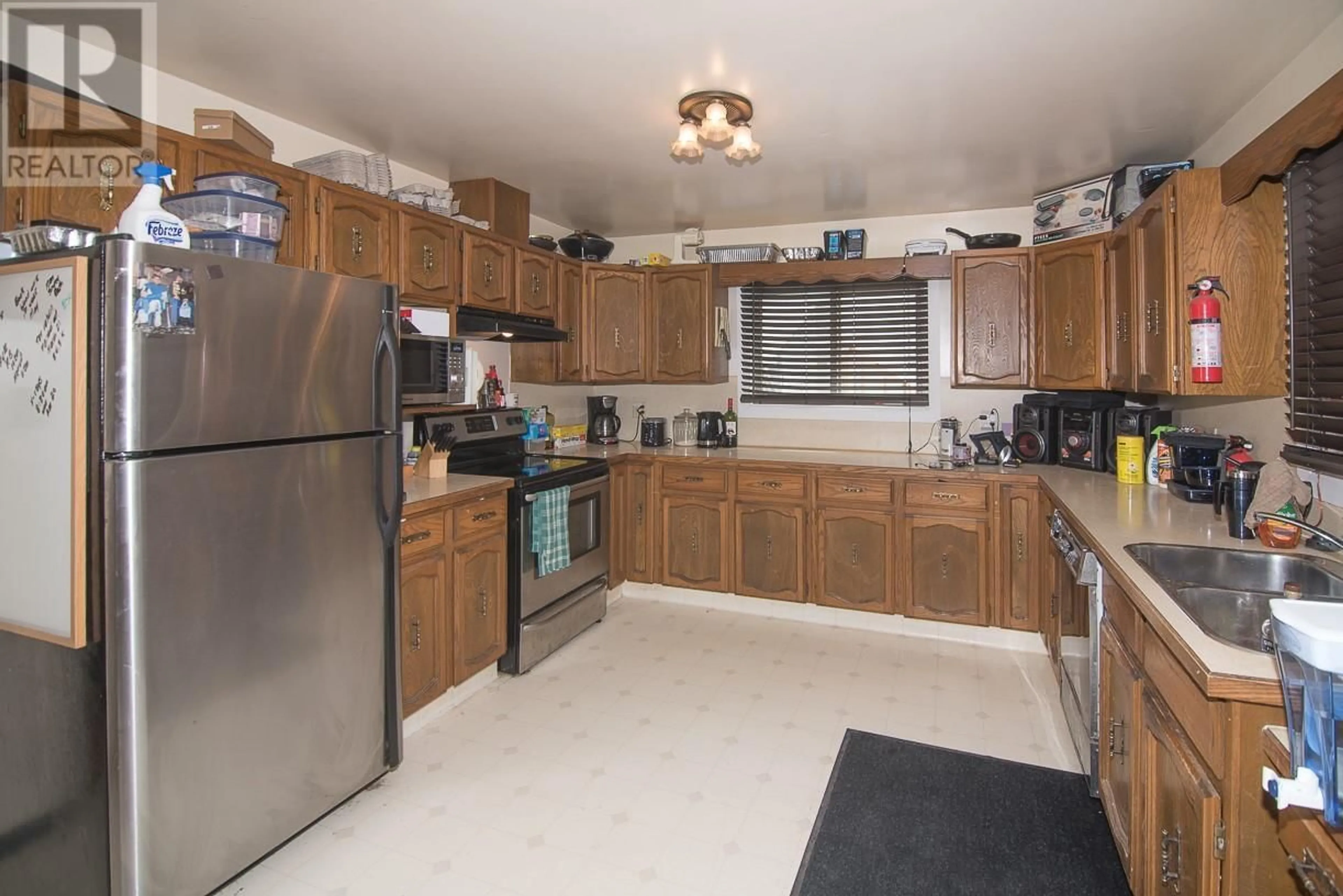 Standard kitchen, ceramic/tile floor for 2138 CLARKE AVENUE, Merritt British Columbia V1K1B8