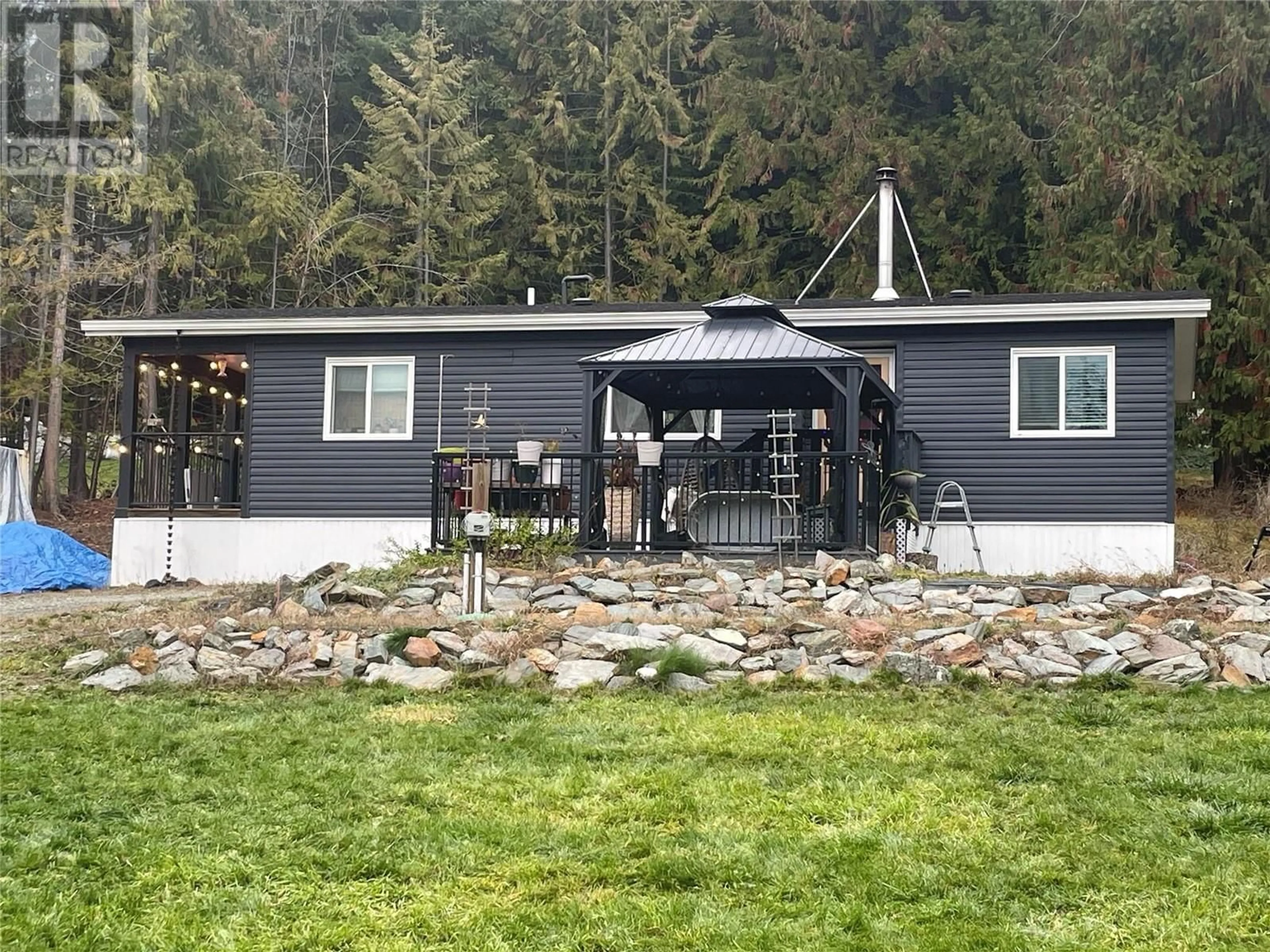 A pic from exterior of the house or condo, cottage for 7443 Estate Drive, Anglemont British Columbia V0E1M8