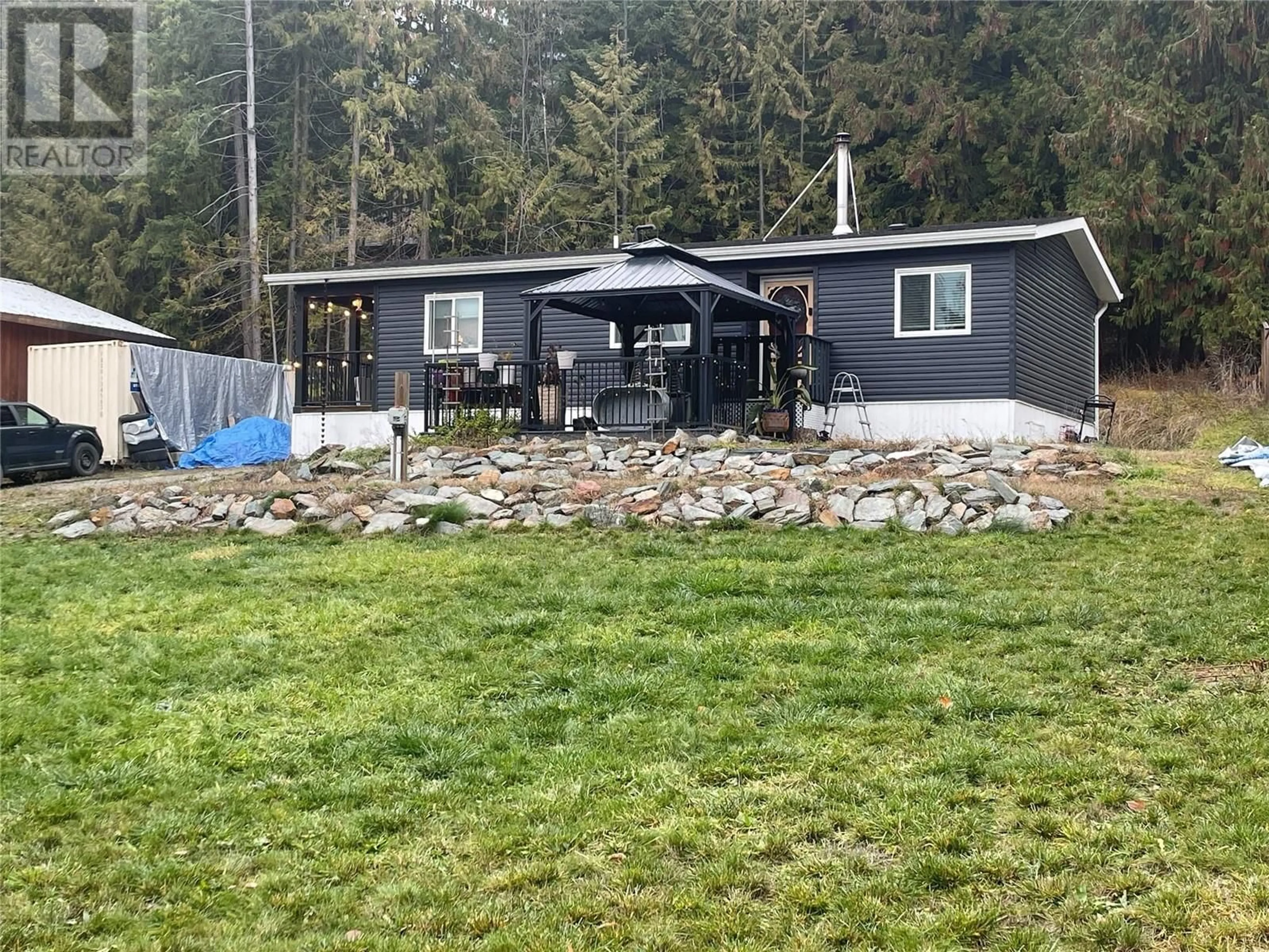 Frontside or backside of a home, cottage for 7443 Estate Drive, Anglemont British Columbia V0E1M8