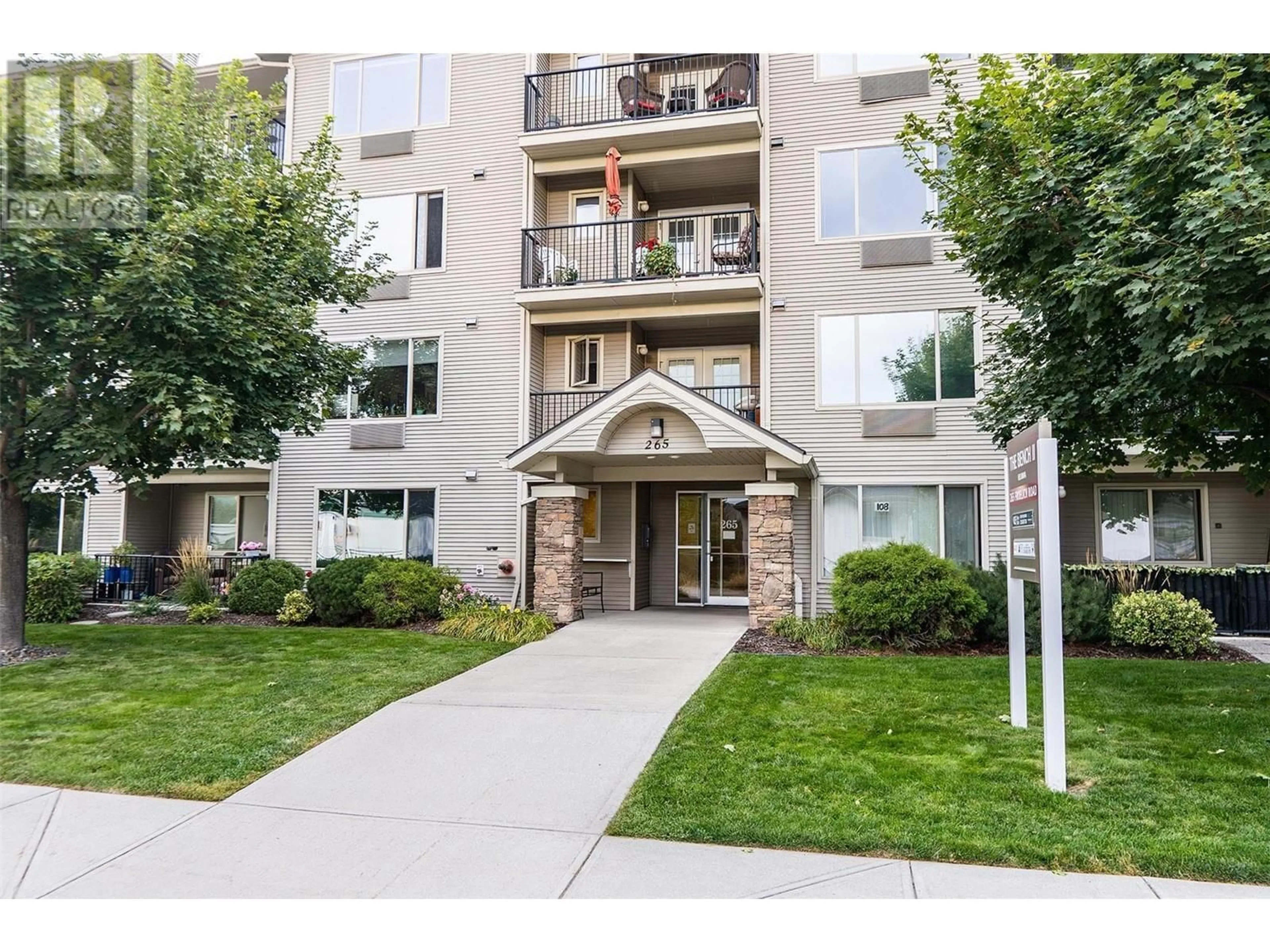 A pic from exterior of the house or condo, the street view for 265 Froelich Road Unit# 307, Kelowna British Columbia V1X3M6