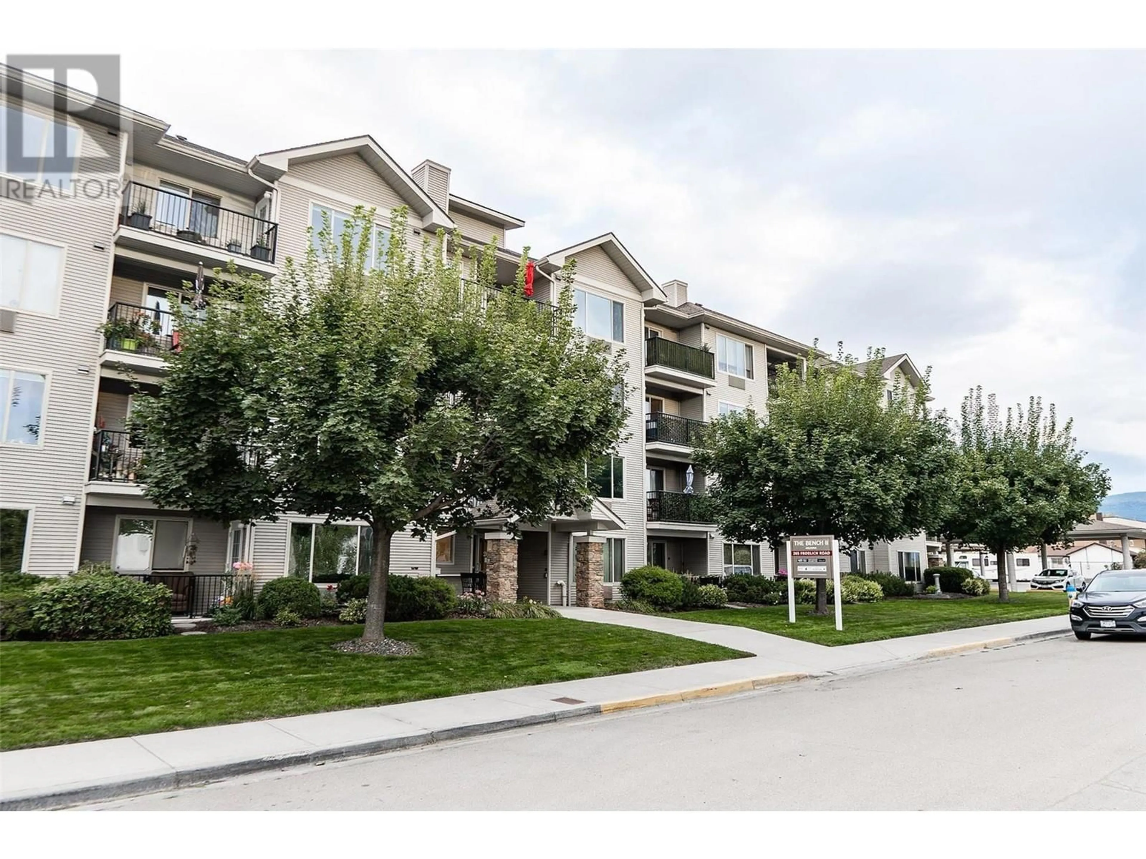 A pic from exterior of the house or condo, the street view for 265 Froelich Road Unit# 307, Kelowna British Columbia V1X3M6