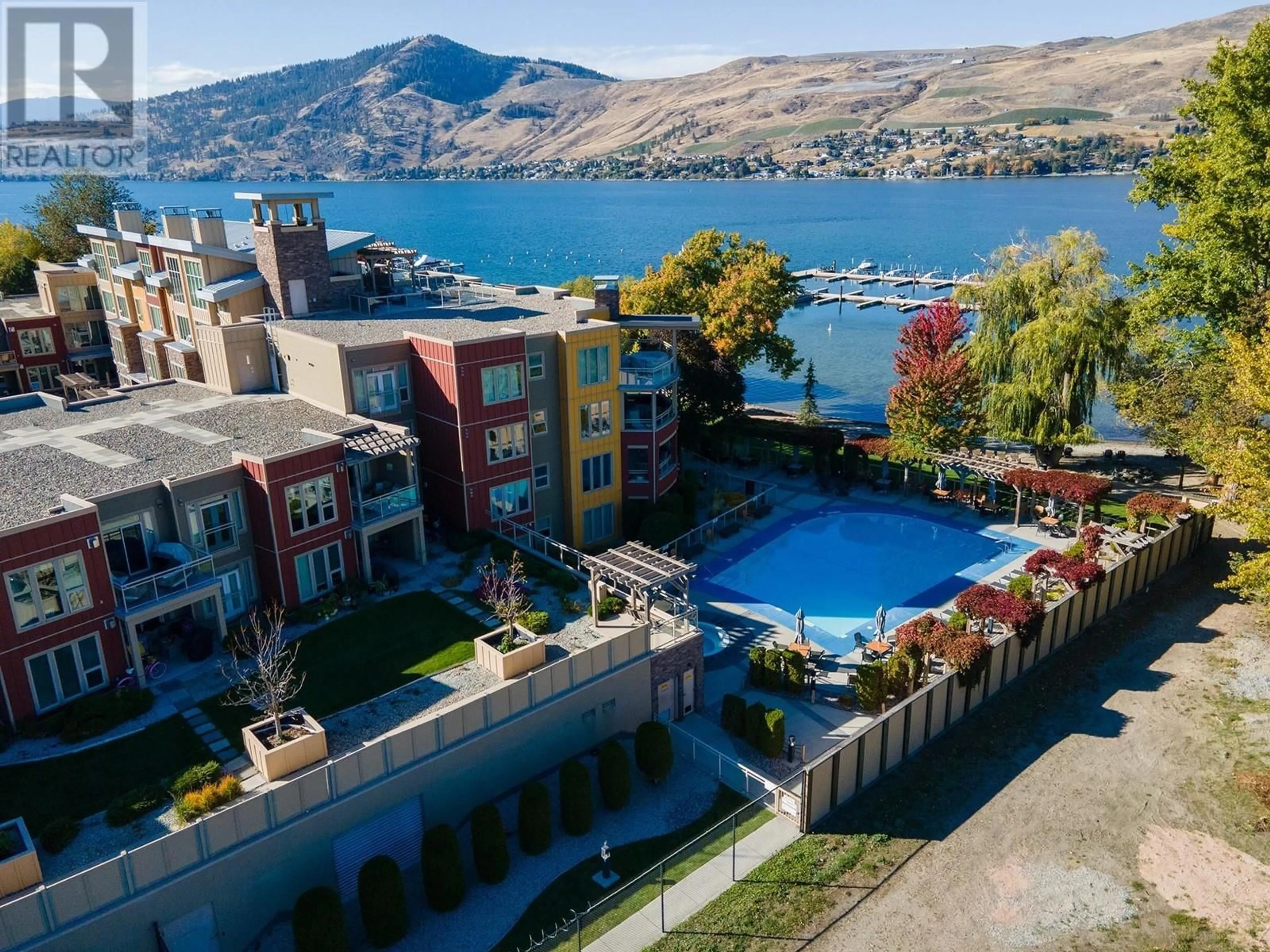 A pic from outside/outdoor area/front of a property/back of a property/a pic from drone, water/lake/river/ocean view for 2402 - 7343 OKANAGAN LANDING ROAD, Vernon British Columbia V1H2J6