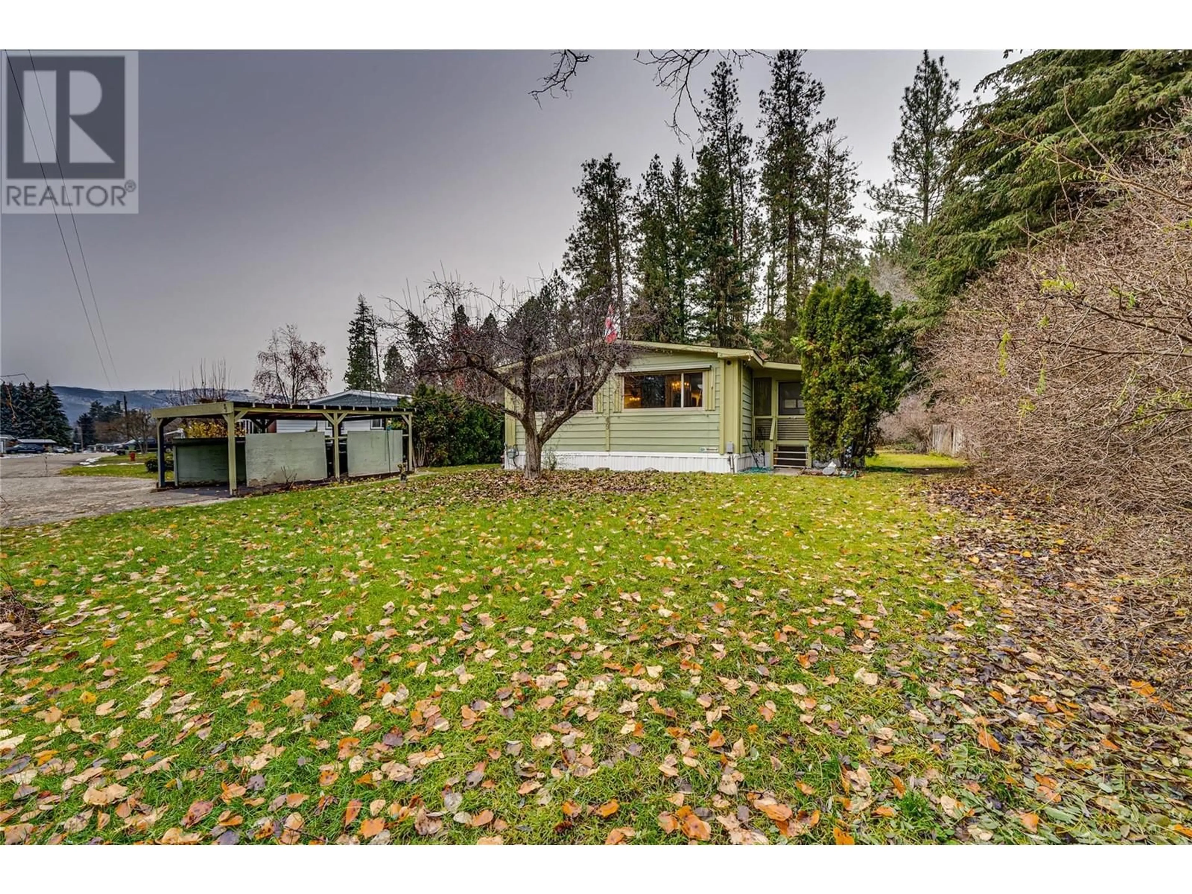 A pic from outside/outdoor area/front of a property/back of a property/a pic from drone, unknown for 49 - 4701 PLEASANT VALLEY ROAD, Vernon British Columbia V1T4M7