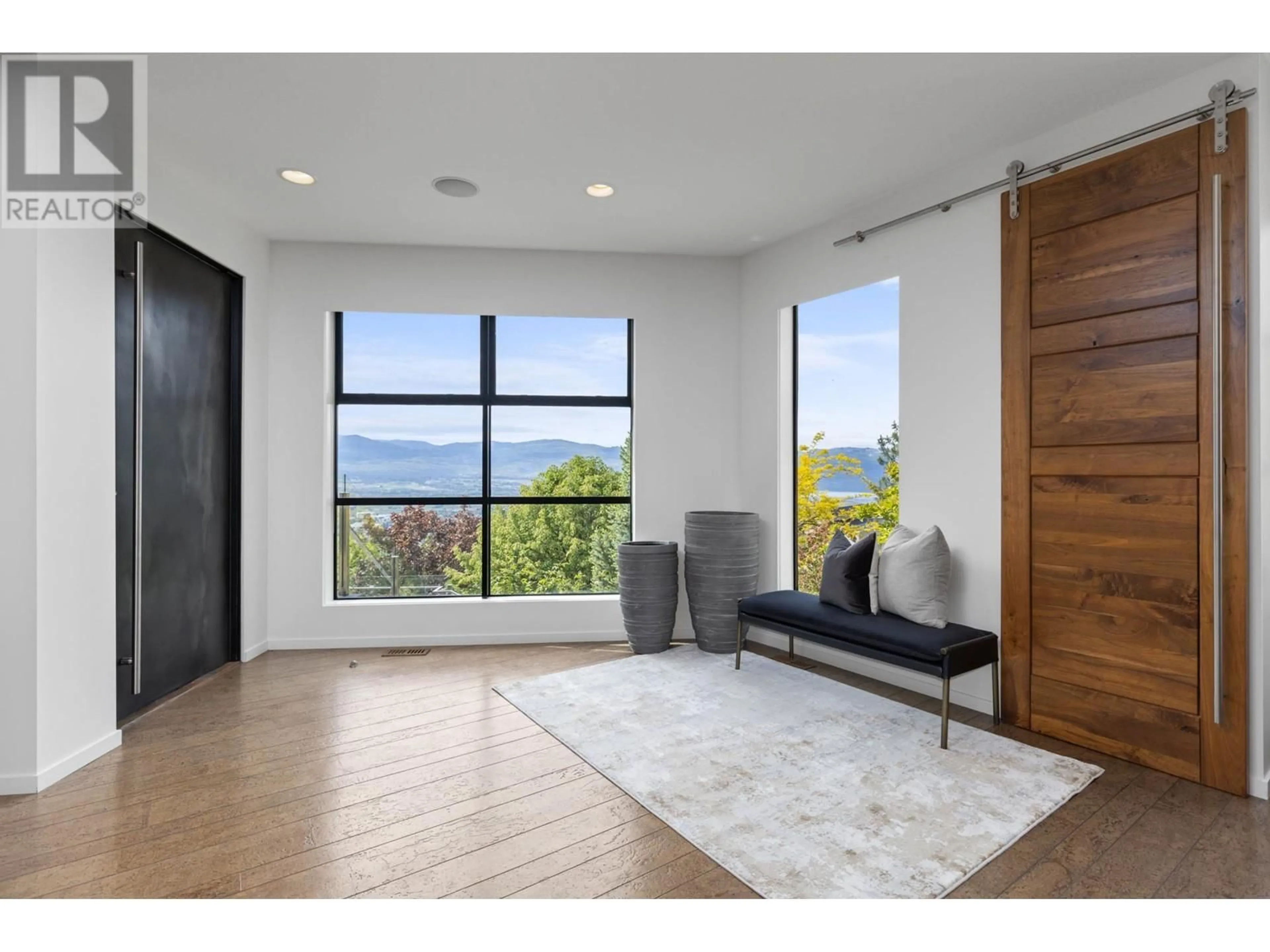 Indoor entryway, wood floors for 1180 Stoneypointe Court, Kelowna British Columbia V1V2Y3