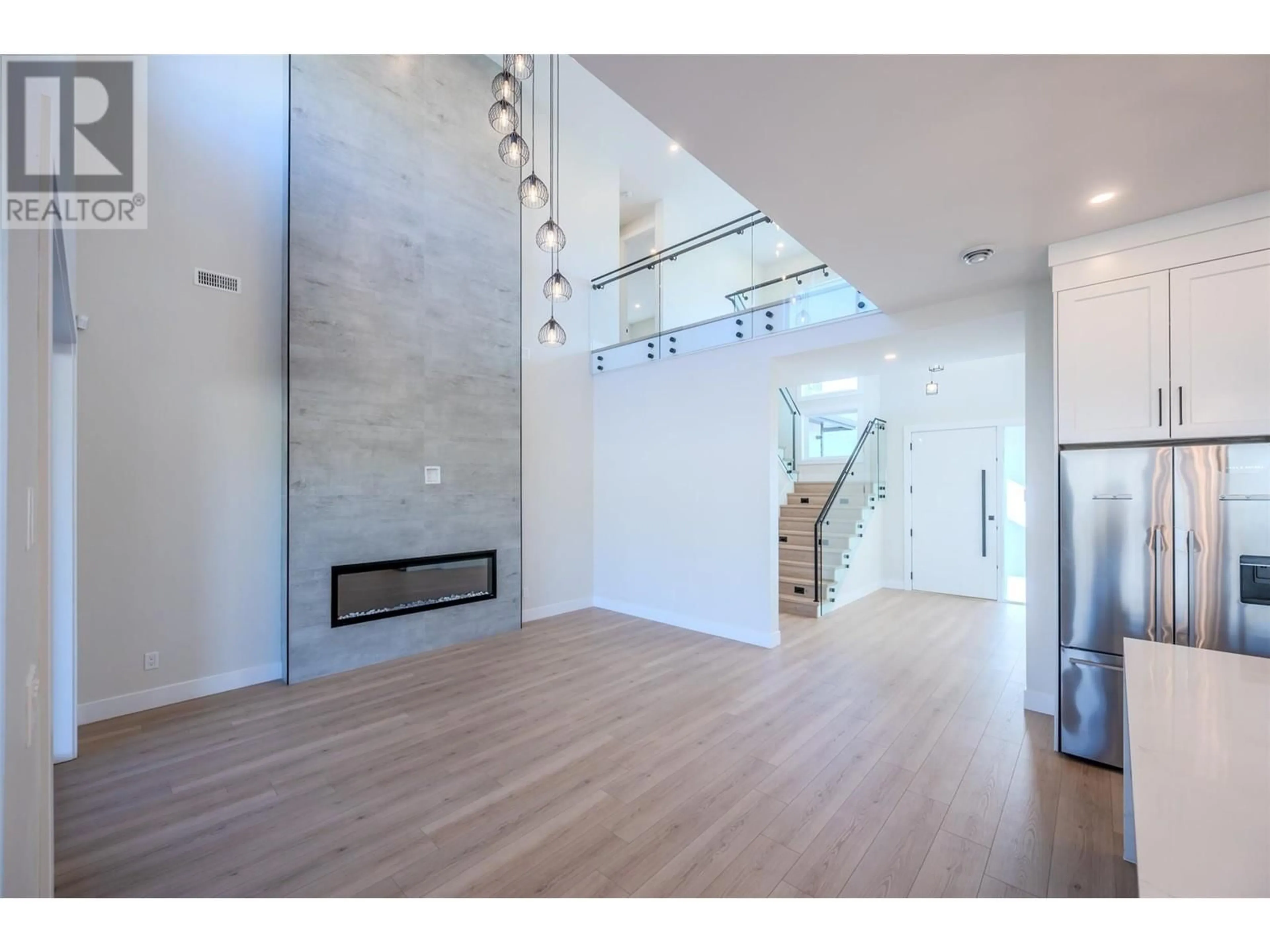 Indoor foyer, wood floors for 1121 ANTLER Drive, Penticton British Columbia V2A0C9