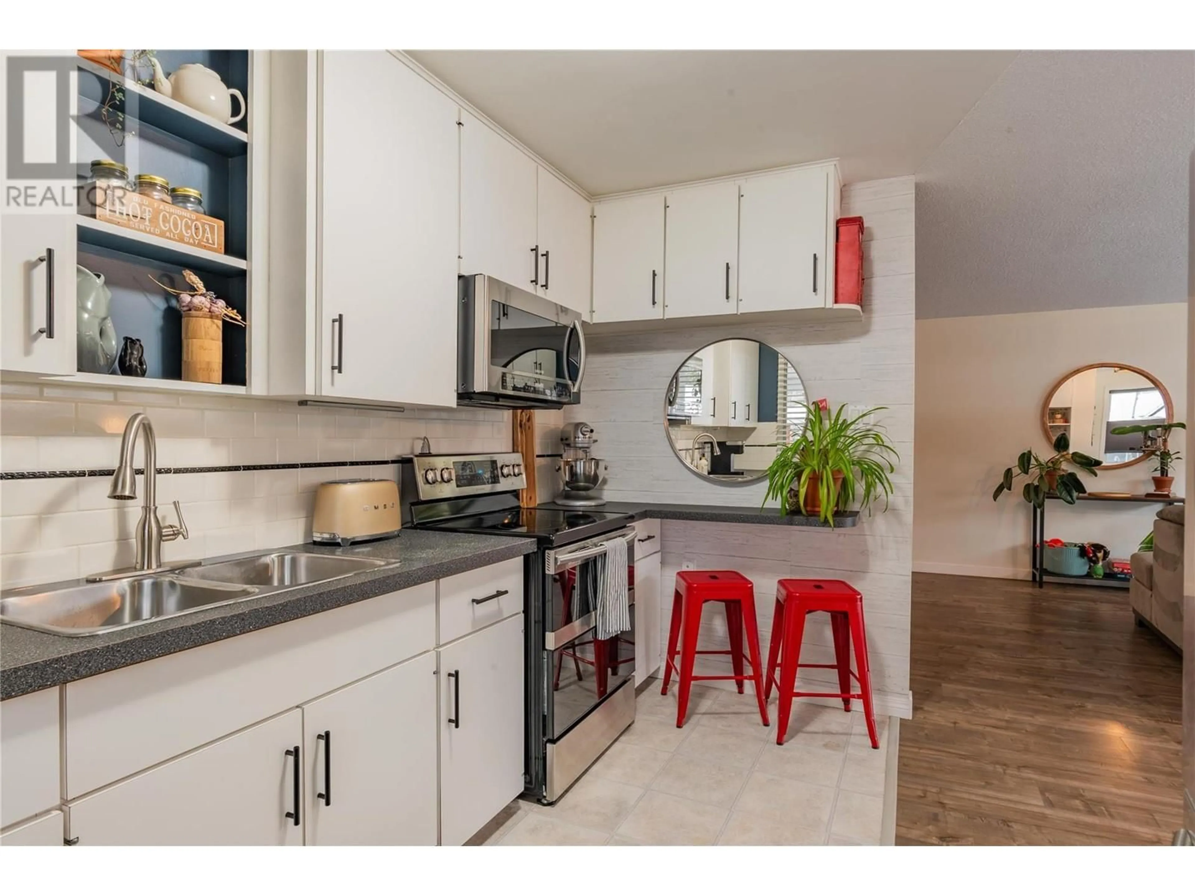 Open concept kitchen for 709 Hermia Crescent, Trail British Columbia V1R1B3