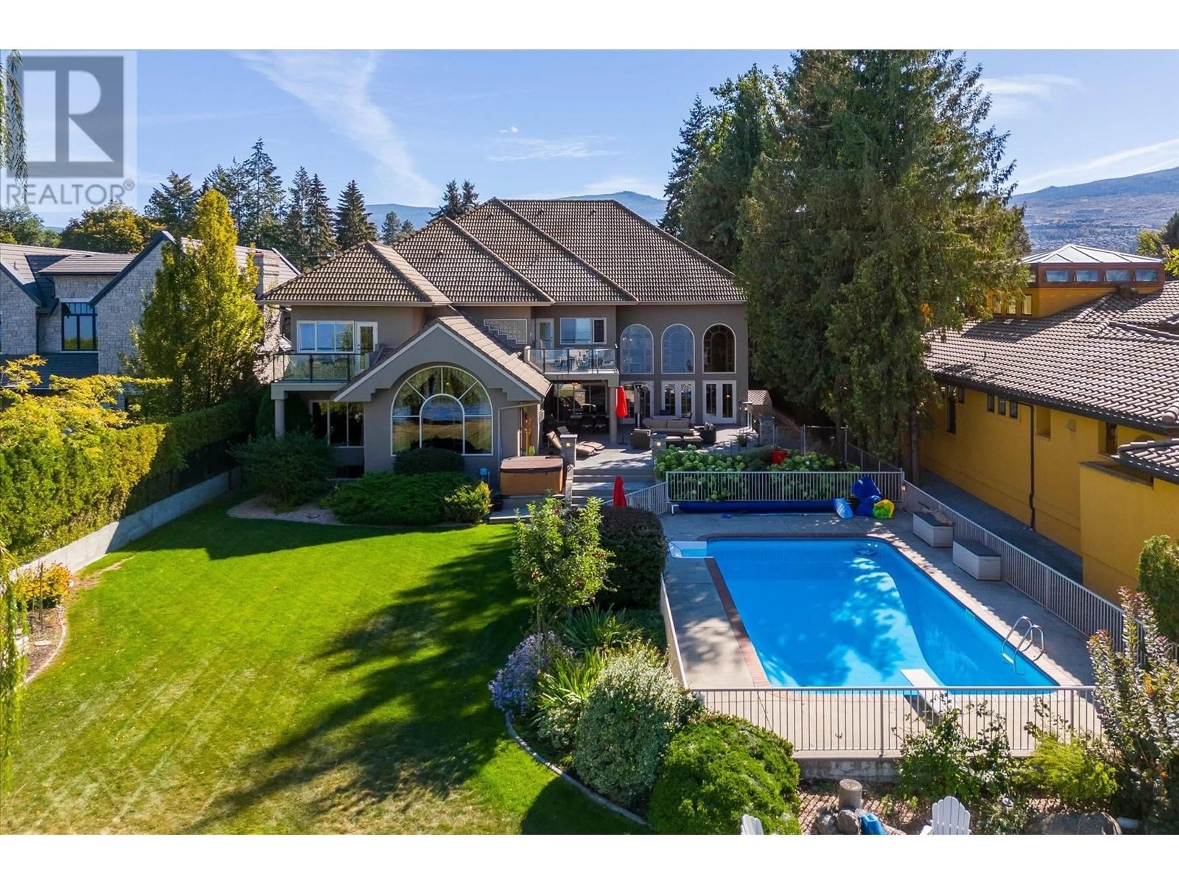 A pic from outside/outdoor area/front of a property/back of a property/a pic from drone, unknown for 4382 HOBSON ROAD, Kelowna British Columbia V1W1Y3