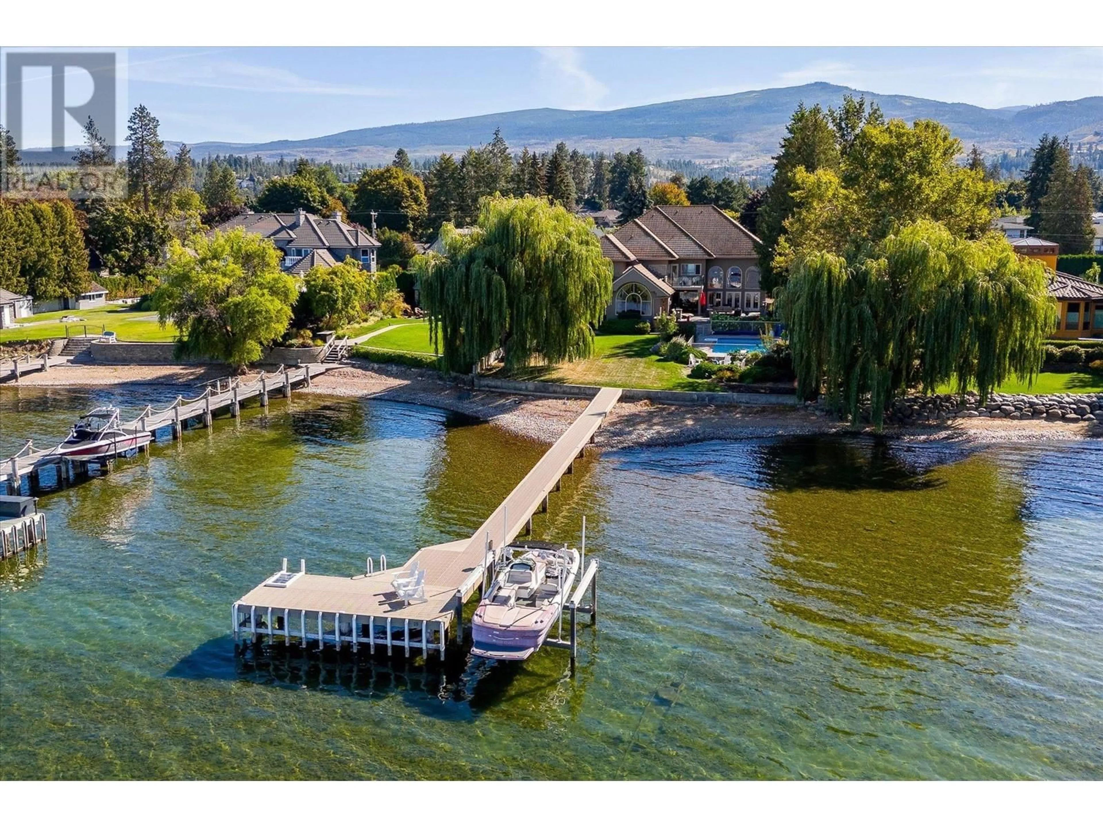 A pic from outside/outdoor area/front of a property/back of a property/a pic from drone, water/lake/river/ocean view for 4382 HOBSON ROAD, Kelowna British Columbia V1W1Y3