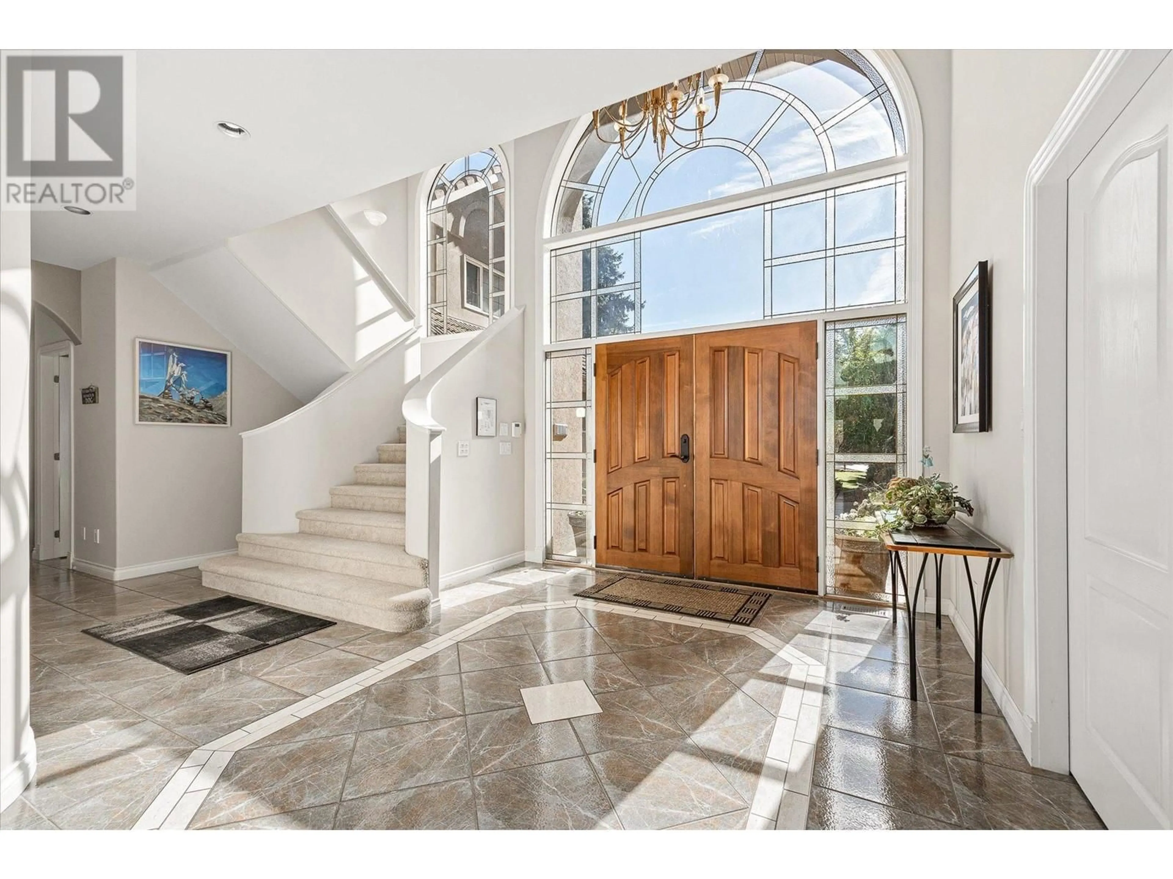 Indoor entryway, wood floors for 4382 Hobson Road, Kelowna British Columbia V1W1Y3