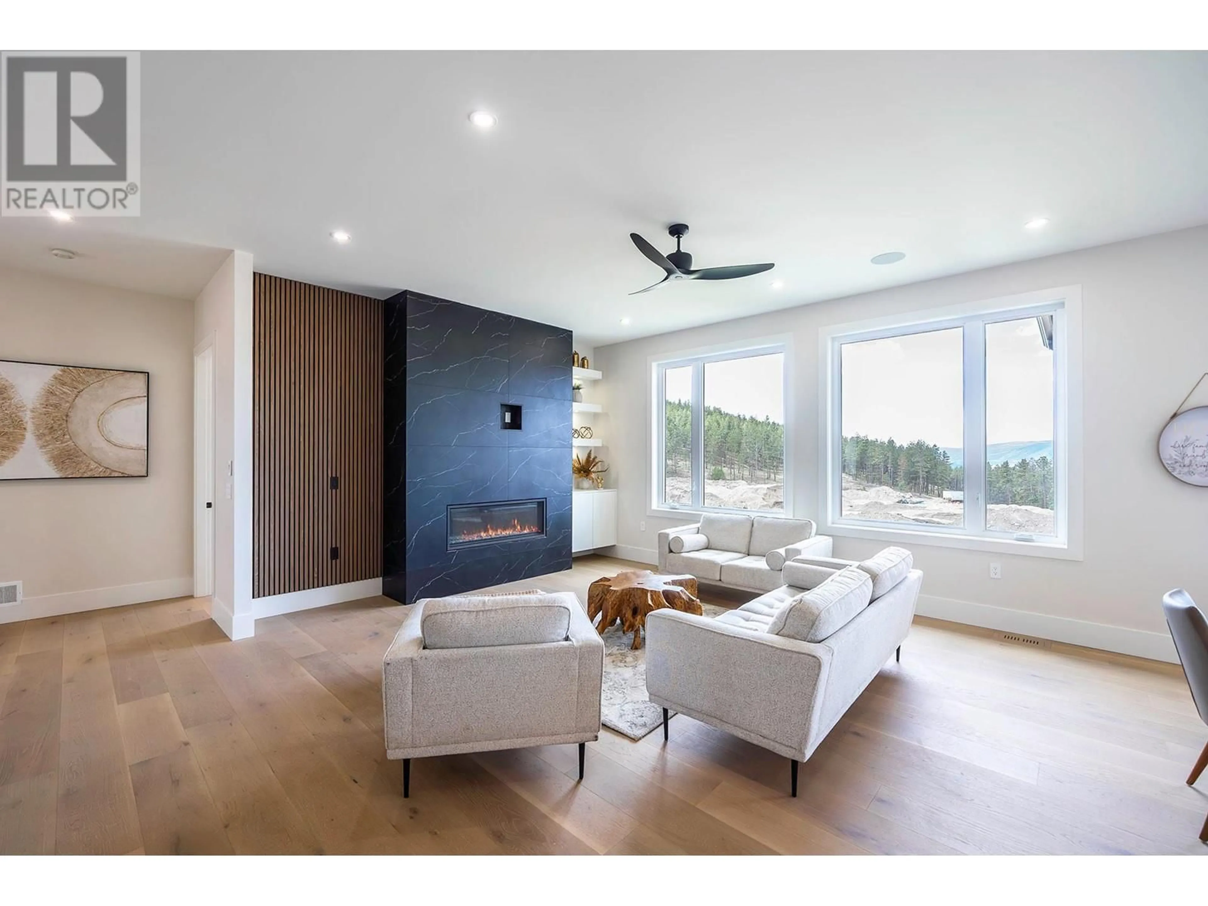 Living room with furniture, unknown for 718 CARNOUSTIE DRIVE, Kelowna British Columbia V1P1V2