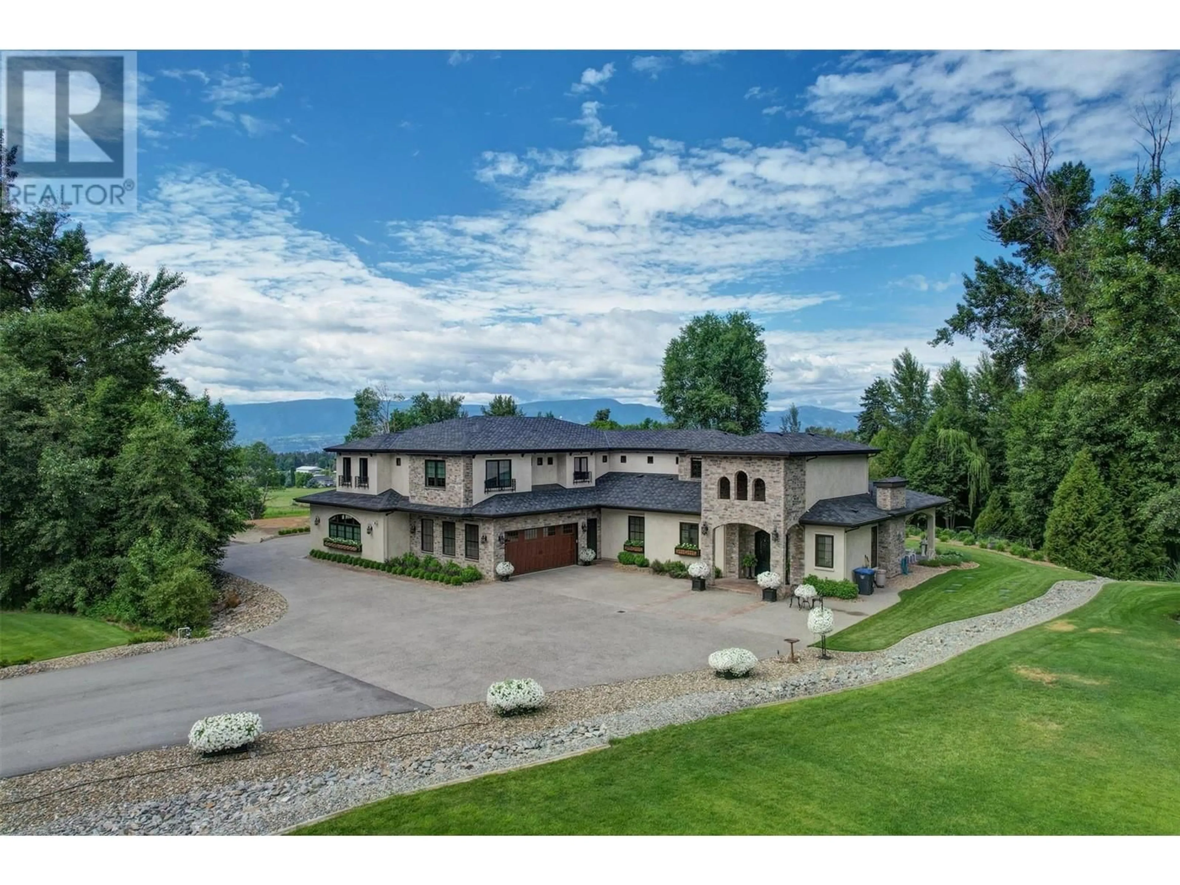 A pic from outside/outdoor area/front of a property/back of a property/a pic from drone, mountain view for 2950 BALLDOCK ROAD, Kelowna British Columbia V1W4C3