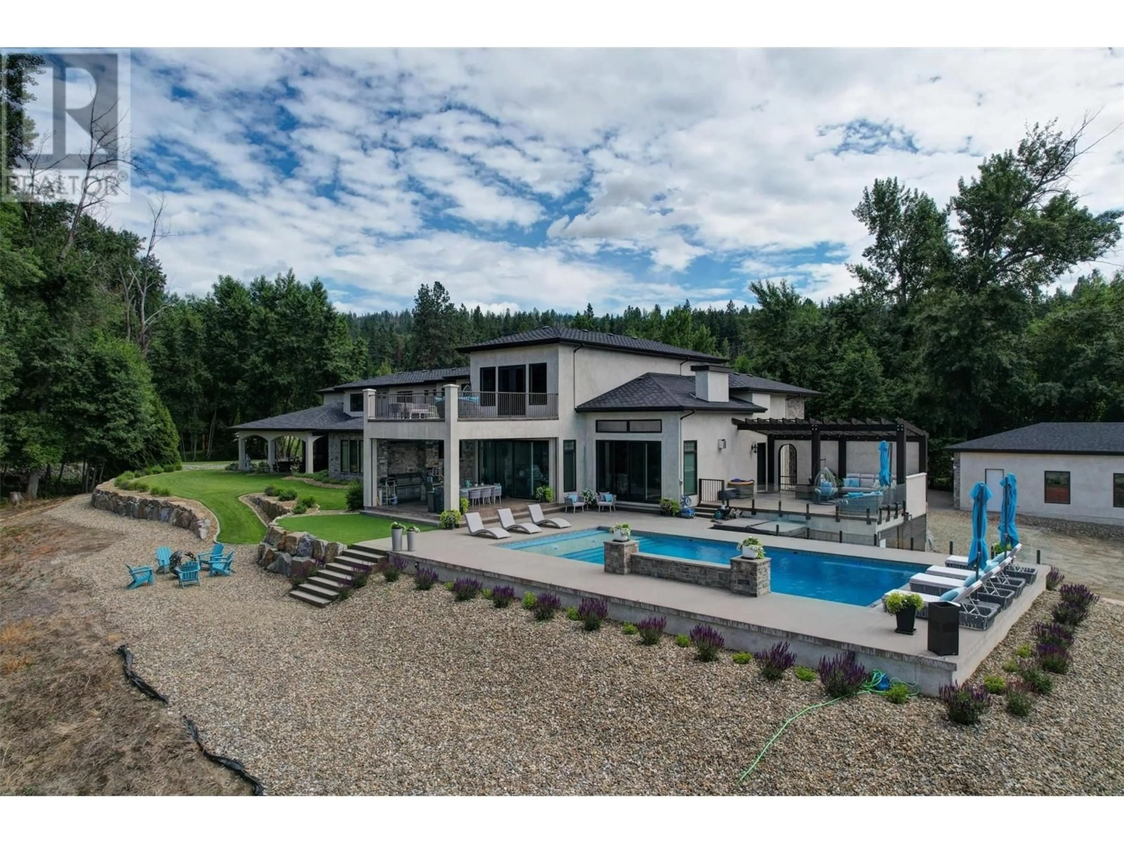 A pic from outside/outdoor area/front of a property/back of a property/a pic from drone, water/lake/river/ocean view for 2950 BALLDOCK ROAD, Kelowna British Columbia V1W4C3