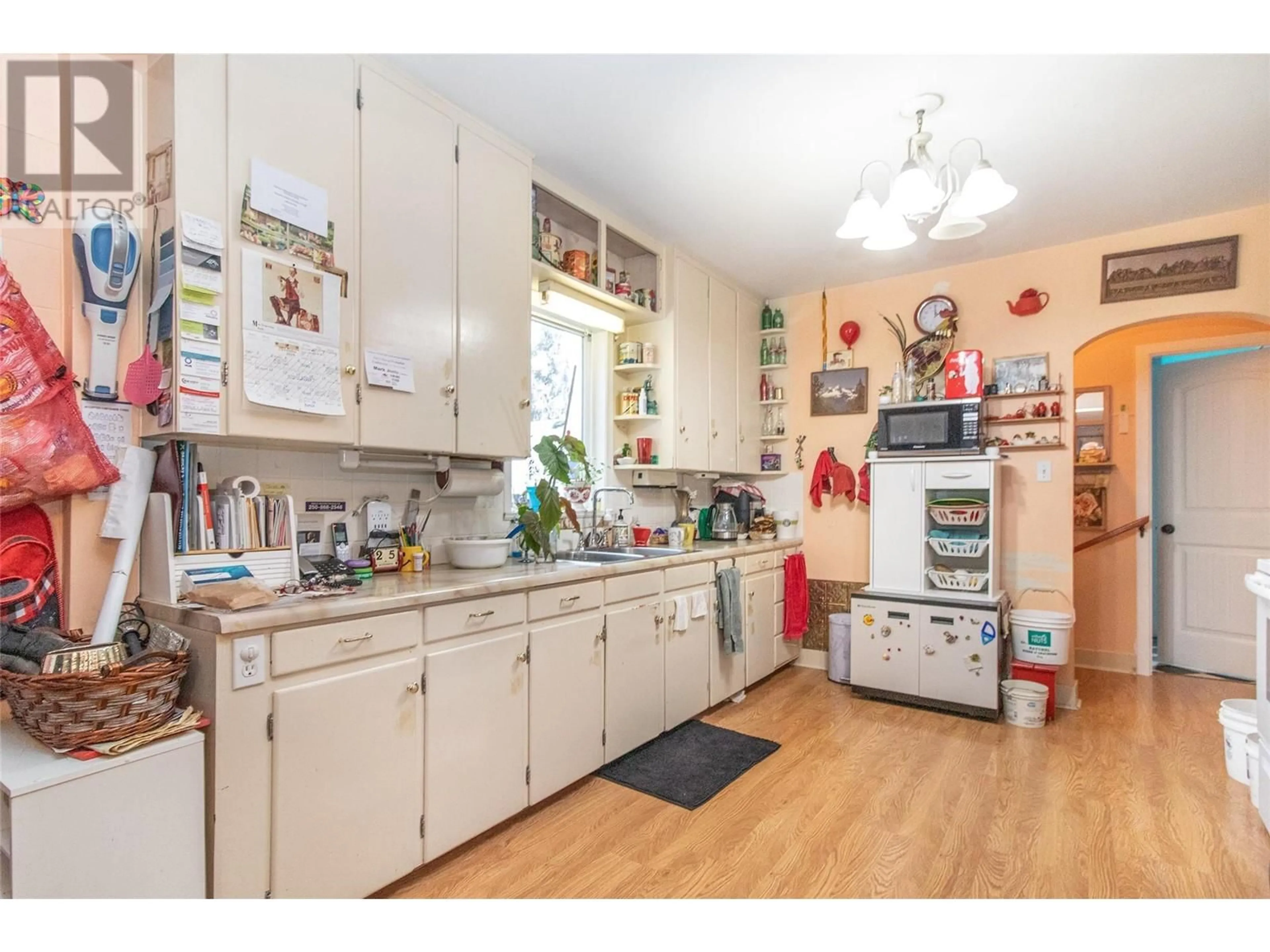 Kitchen, wood floors, cottage for 695 Bell Road, Kelowna British Columbia V1X2Y2