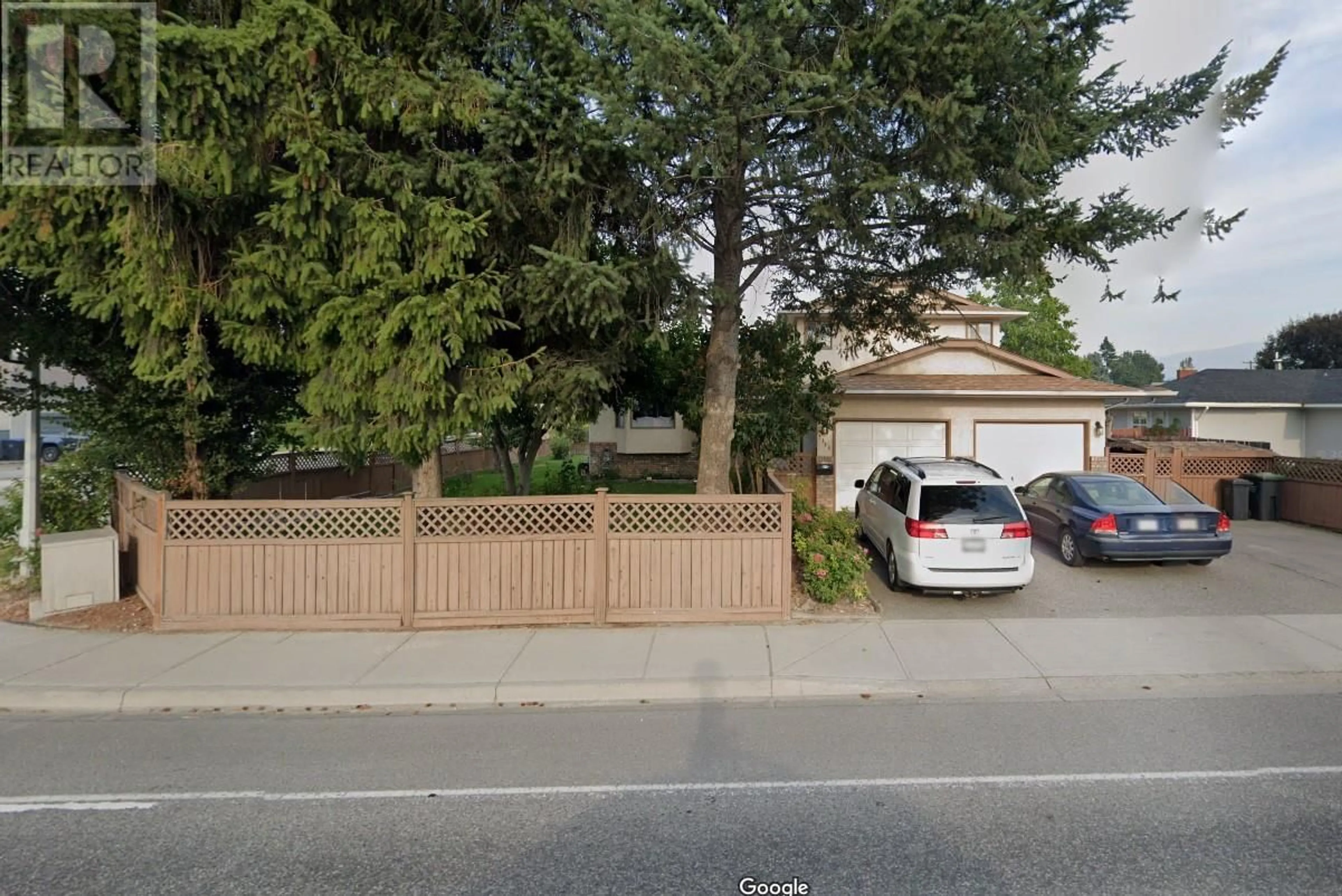 A pic from outside/outdoor area/front of a property/back of a property/a pic from drone, street for 3343 Gordon Drive, Kelowna British Columbia V1W3M9