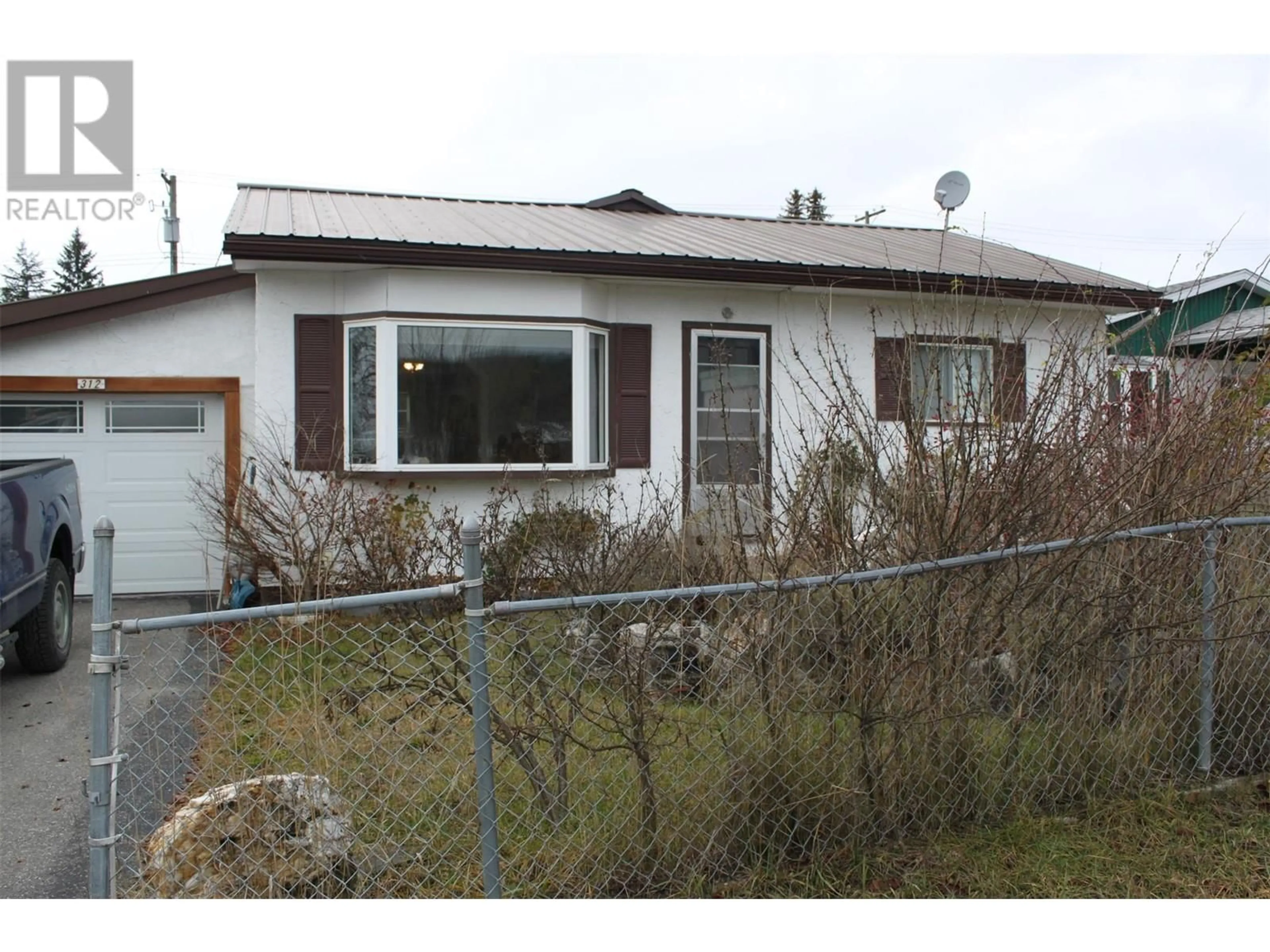 Frontside or backside of a home, cottage for 312 7th Avenue, Nakusp British Columbia V0G1R0