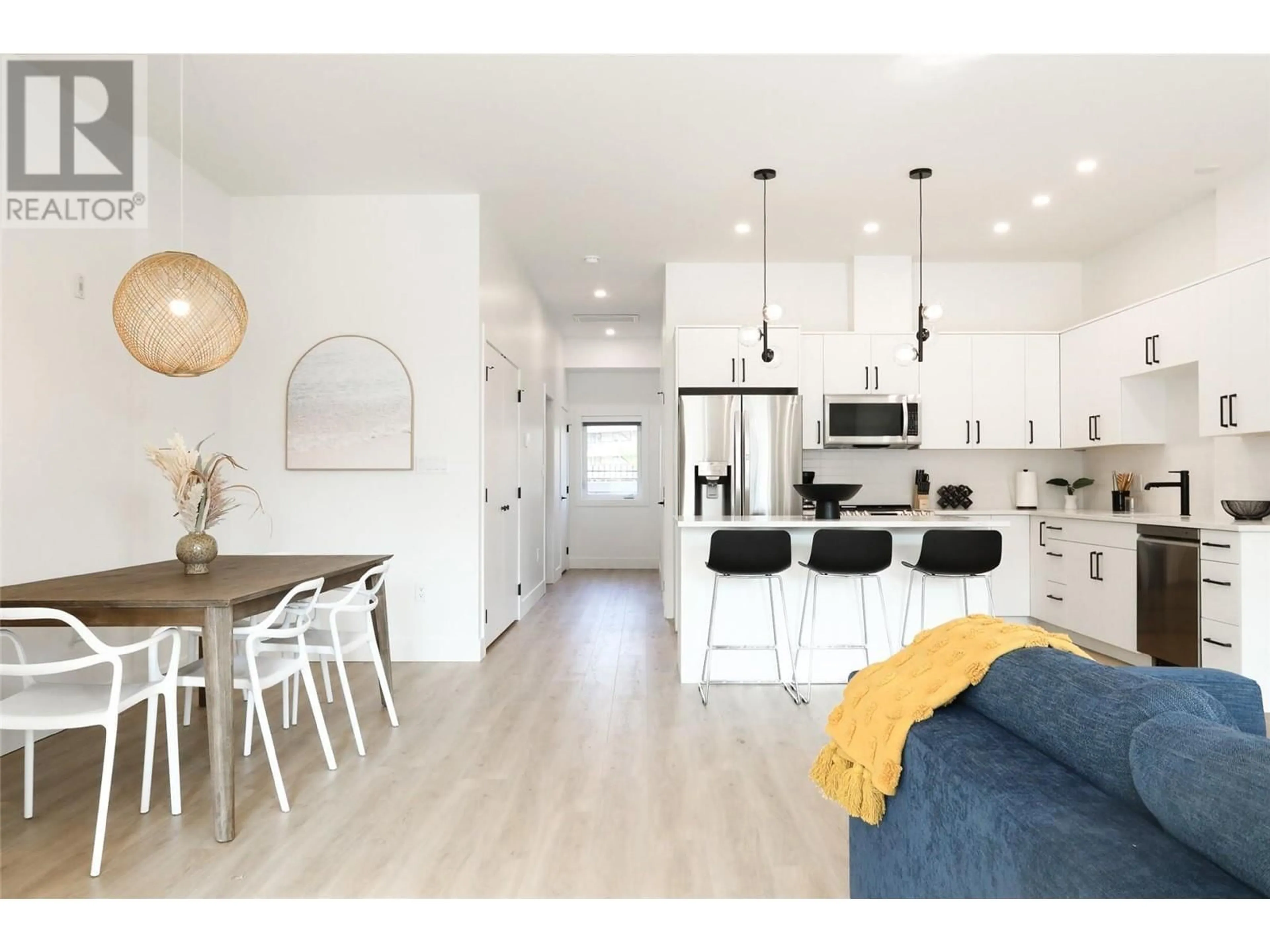 Open concept kitchen, wood/laminate floor for 102 - 850 RAILWAY LANE, Okanagan Falls British Columbia V0H1R4