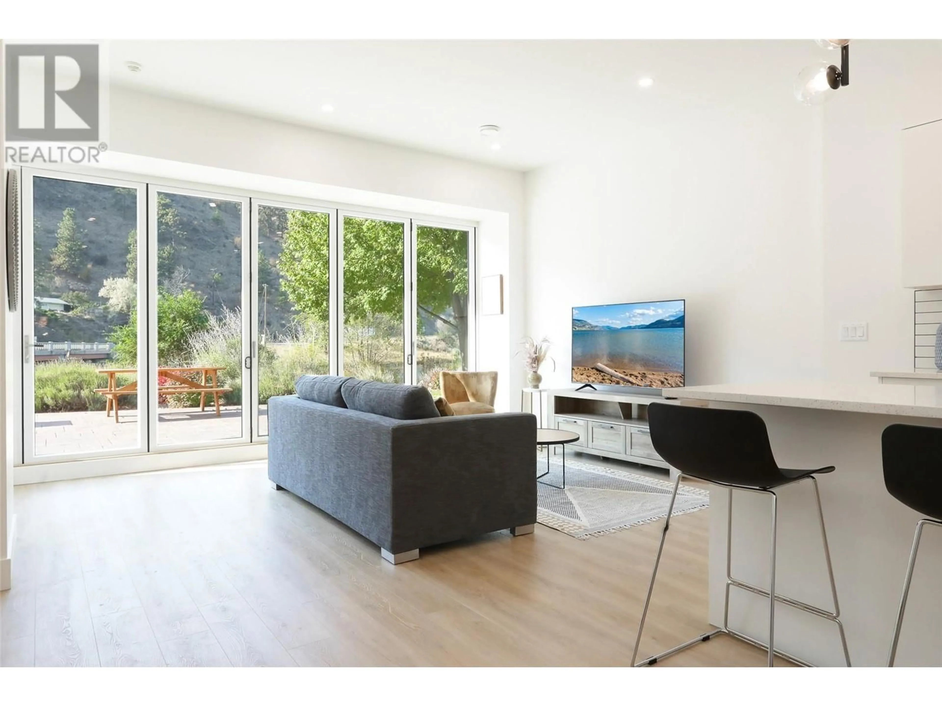 Living room with furniture, wood/laminate floor for 106 - 850 RAILWAY LANE, Okanagan Falls British Columbia V0H1R4