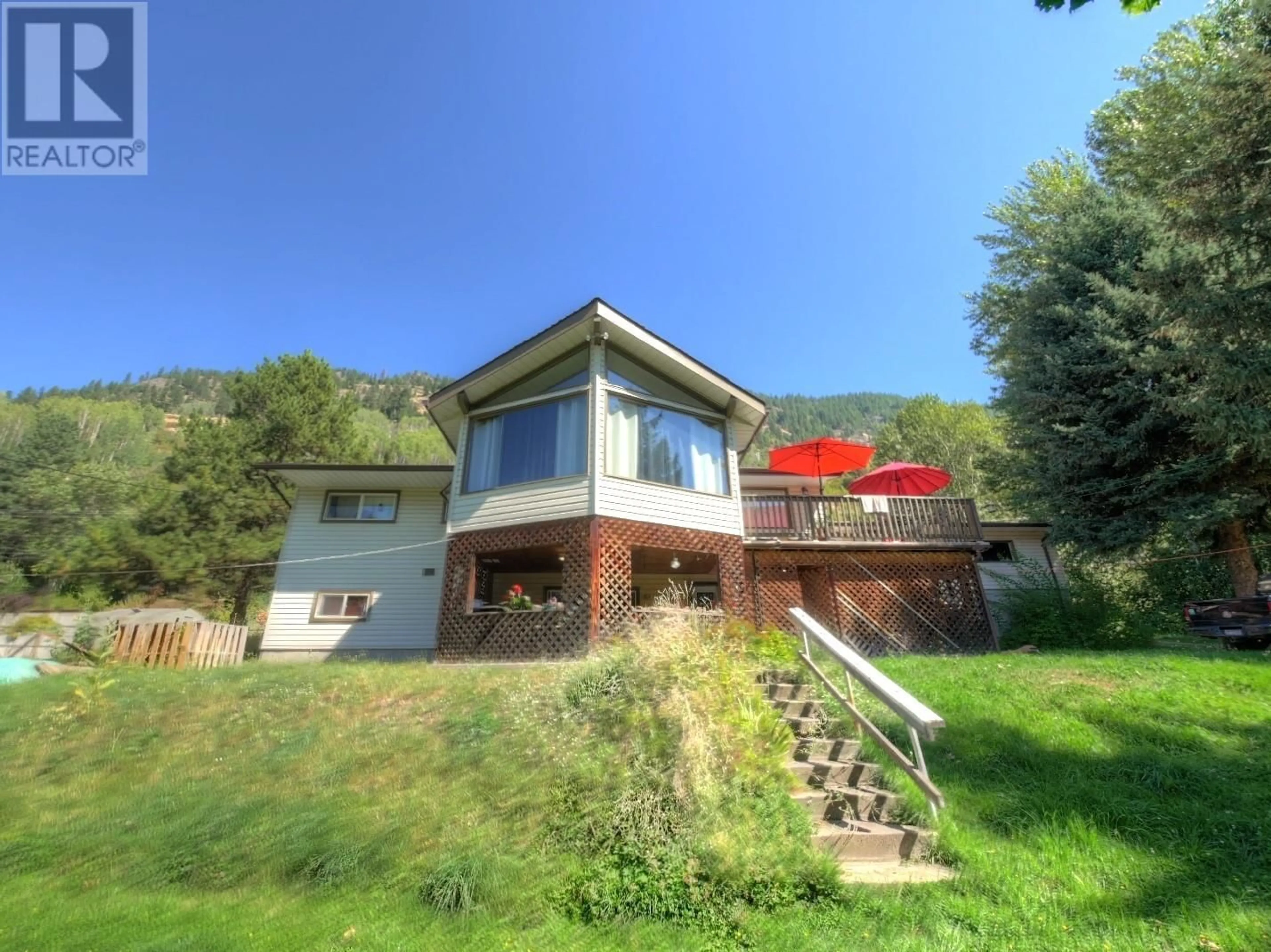 Frontside or backside of a home, cottage for 1124 Pass Creek Road, Castlegar British Columbia V1N4S1