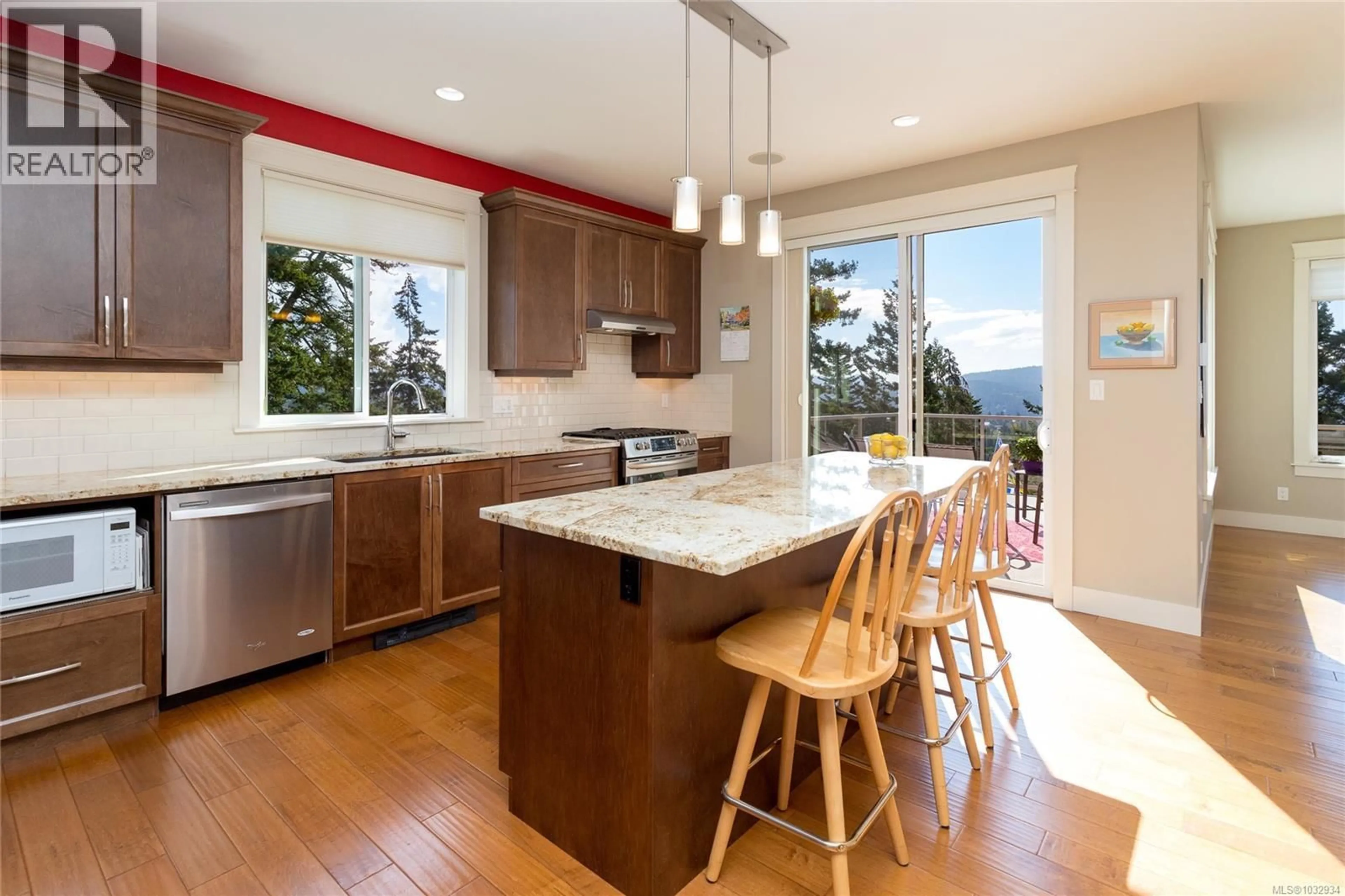 Open concept kitchen, wood/laminate floor for 6963 BENTLEY PLACE, Sooke British Columbia V9Z1M4