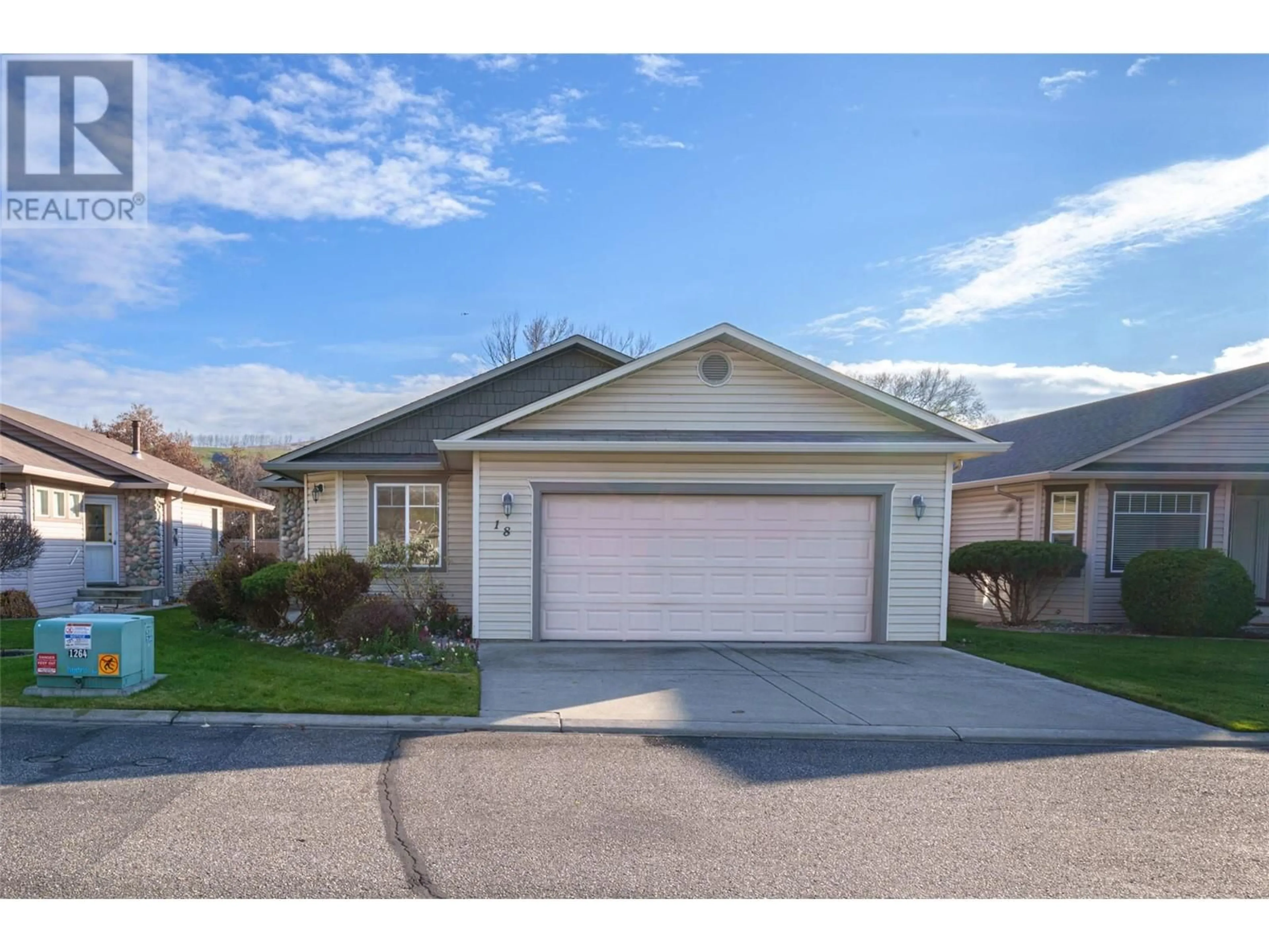 Frontside or backside of a home, the street view for 5888 Okanagan Landing Road Unit# 18, Vernon British Columbia V1H1S2