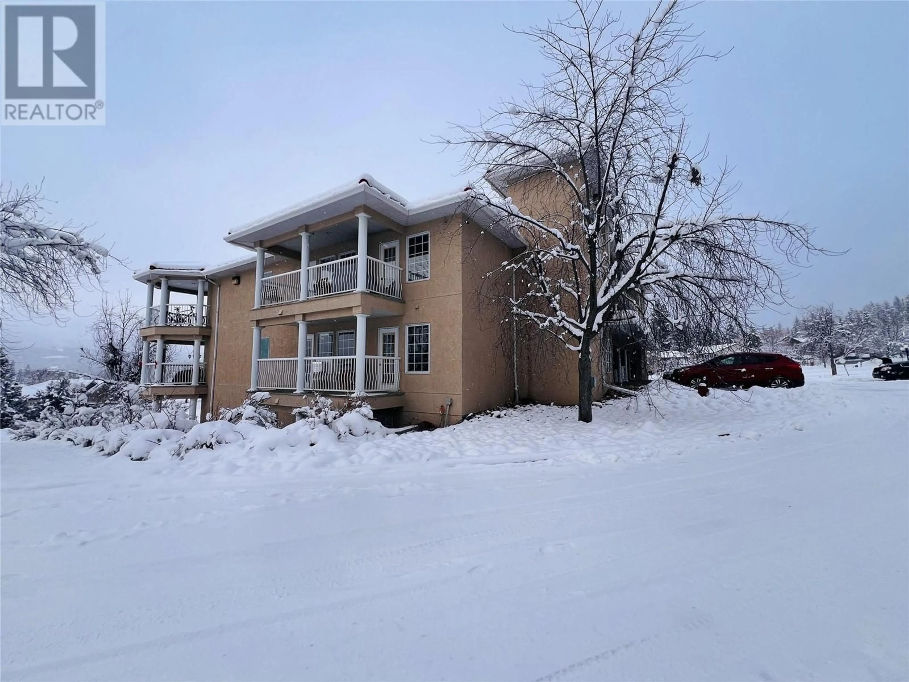 A pic from exterior of the house or condo, the front or back of building for 5052 Riverview Road Road Unit# 5005B, Fairmont Hot Springs British Columbia V0B1L1