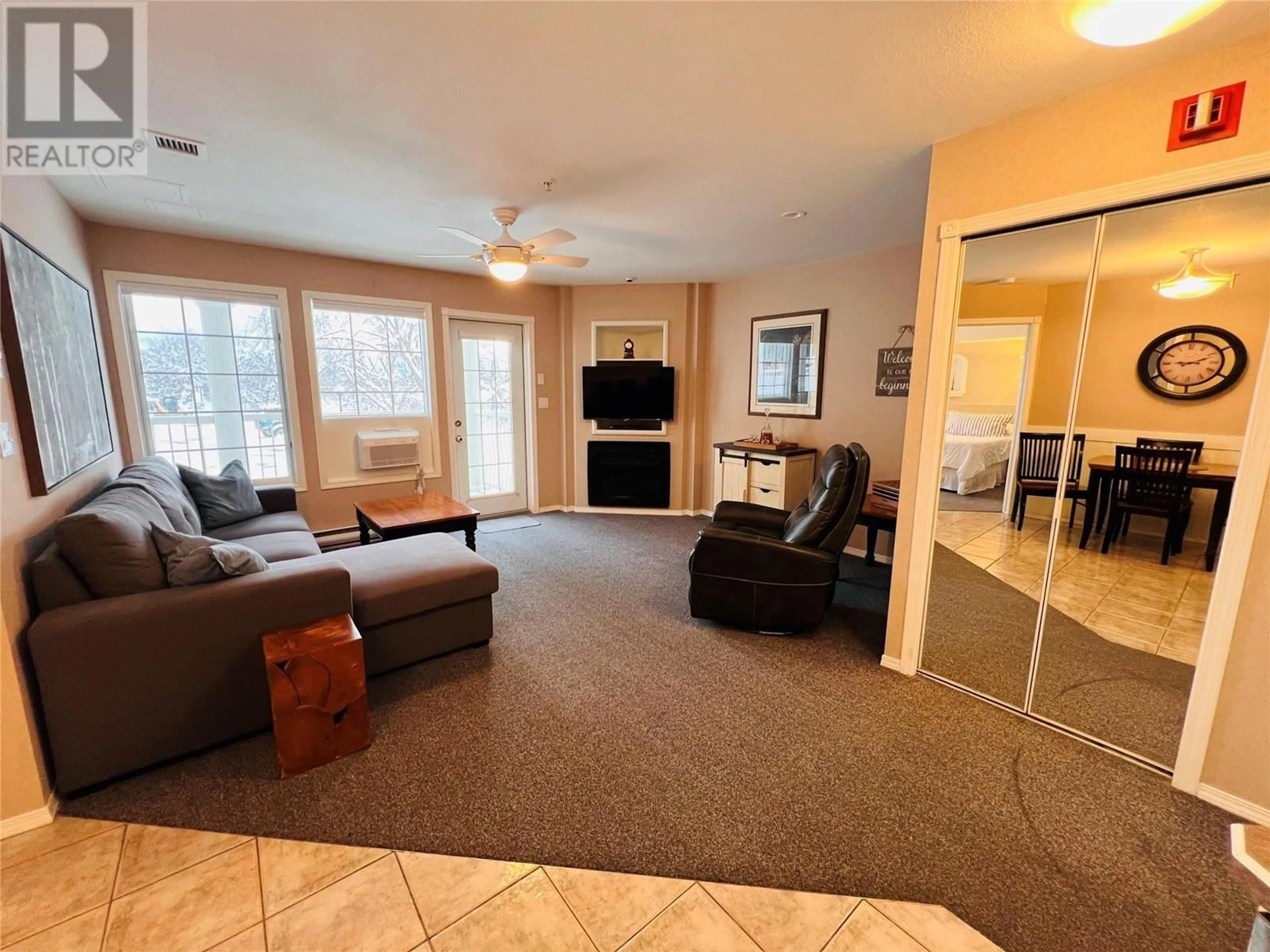 Living room, carpet floors for 5052 Riverview Road Road Unit# 5005B, Fairmont Hot Springs British Columbia V0B1L1