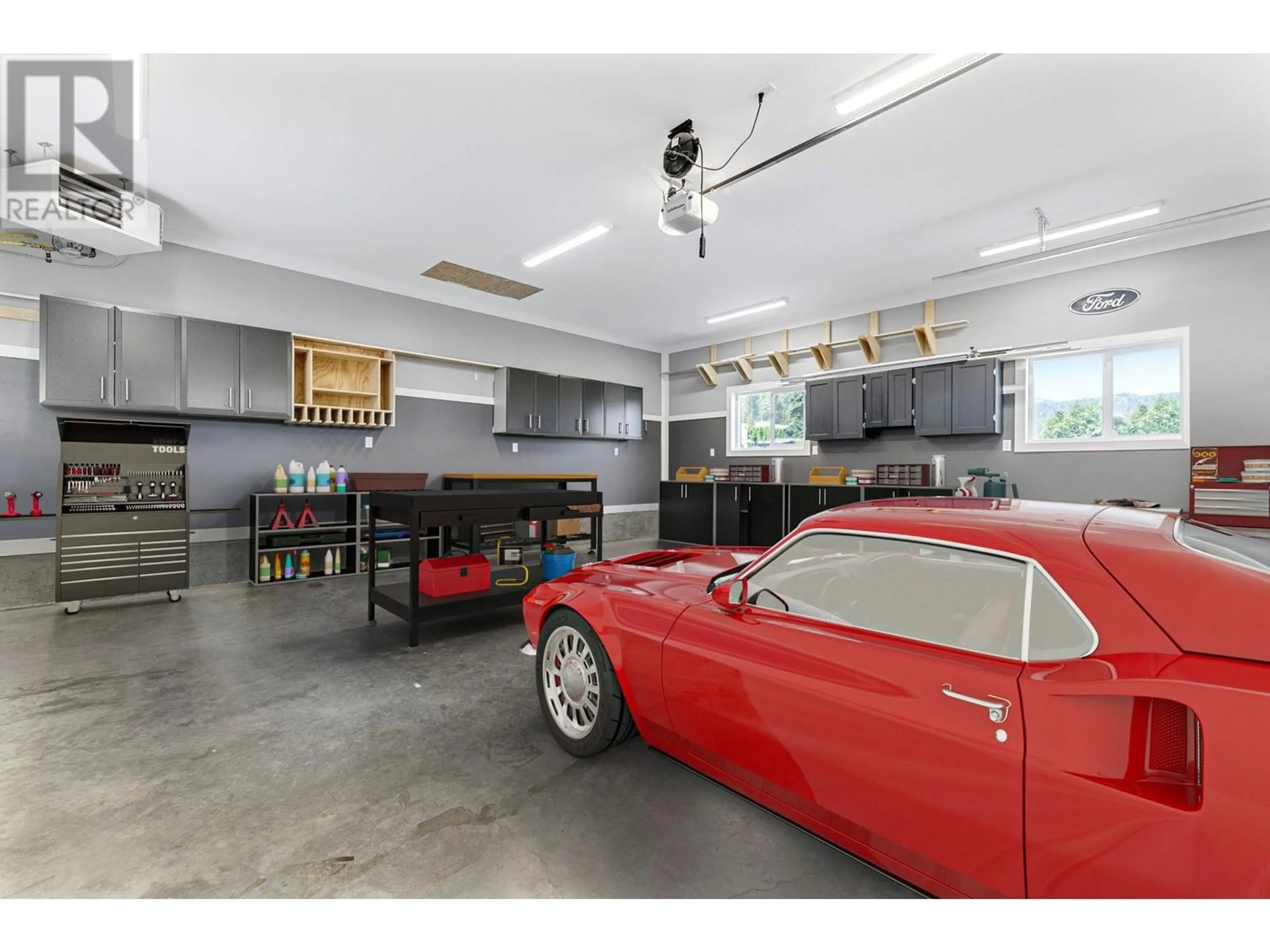 Indoor garage, cement floor for 6242 Whinton Crescent, Peachland British Columbia V0H1X7