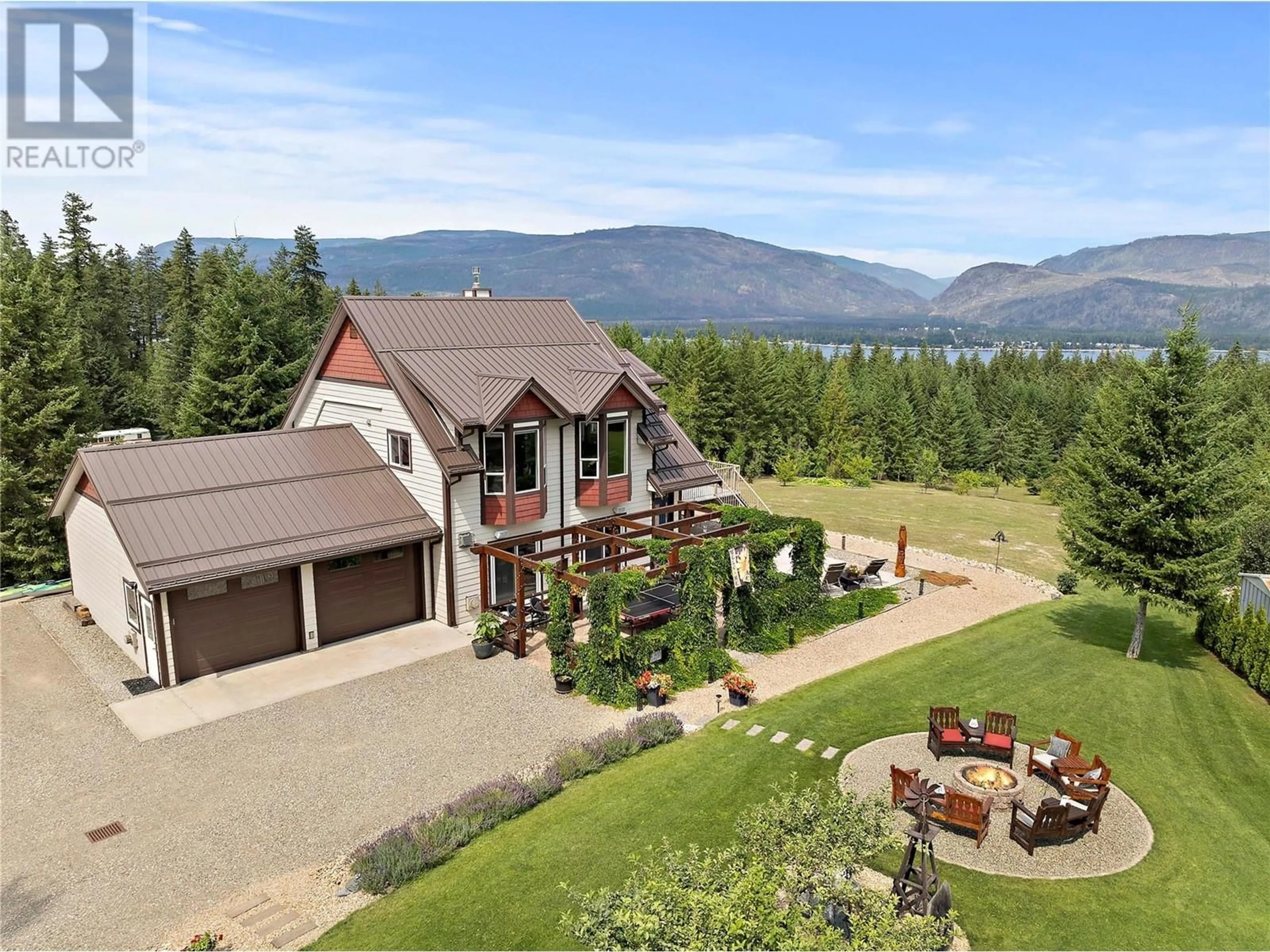 A pic from outside/outdoor area/front of a property/back of a property/a pic from drone, mountain view for 2672 McKenzie Road, Sorrento British Columbia V0E2W1