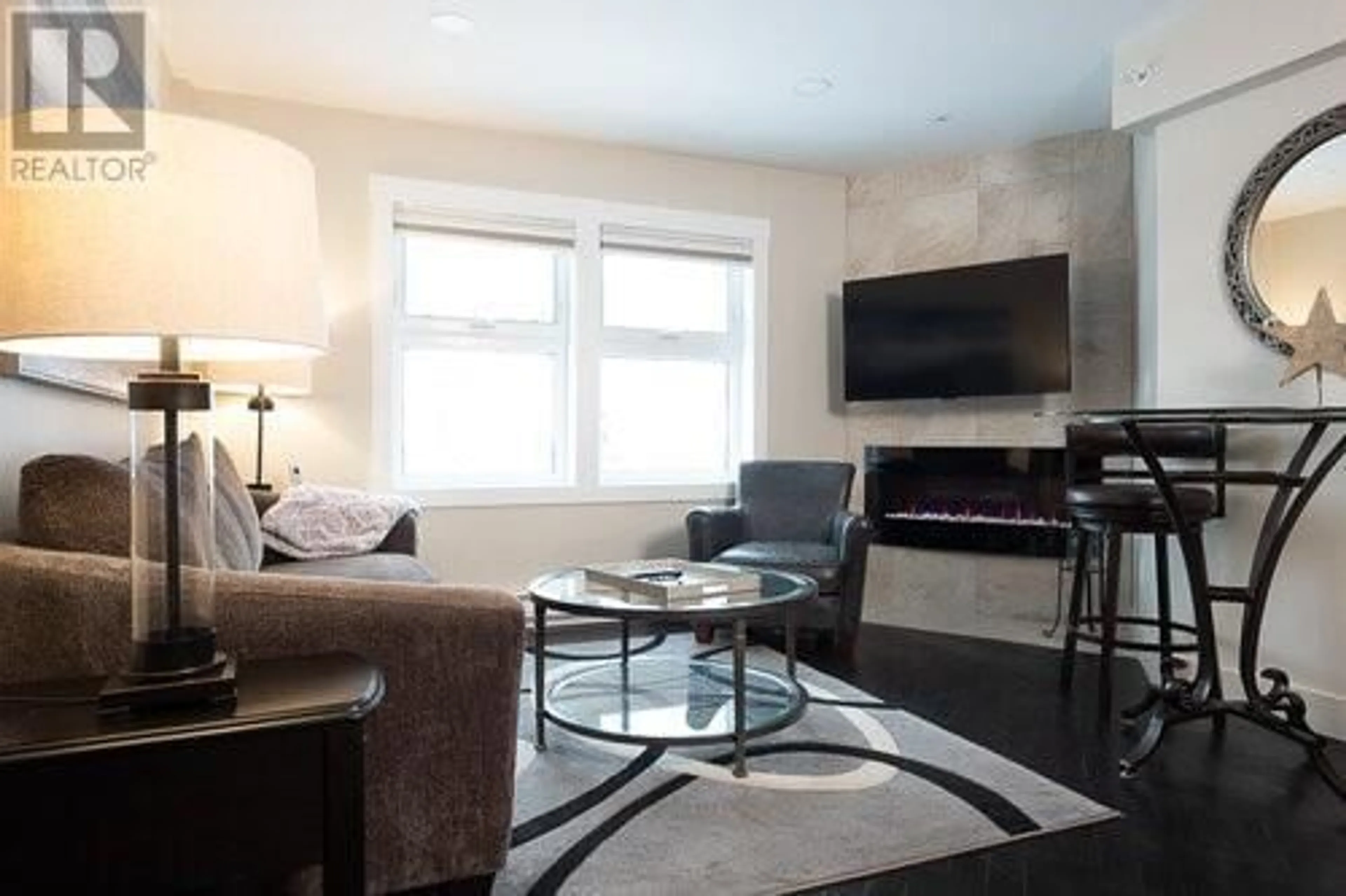 Living room with furniture, unknown for 301 - 148 SILVER LODE LANE, Silver Star British Columbia V1B3M1