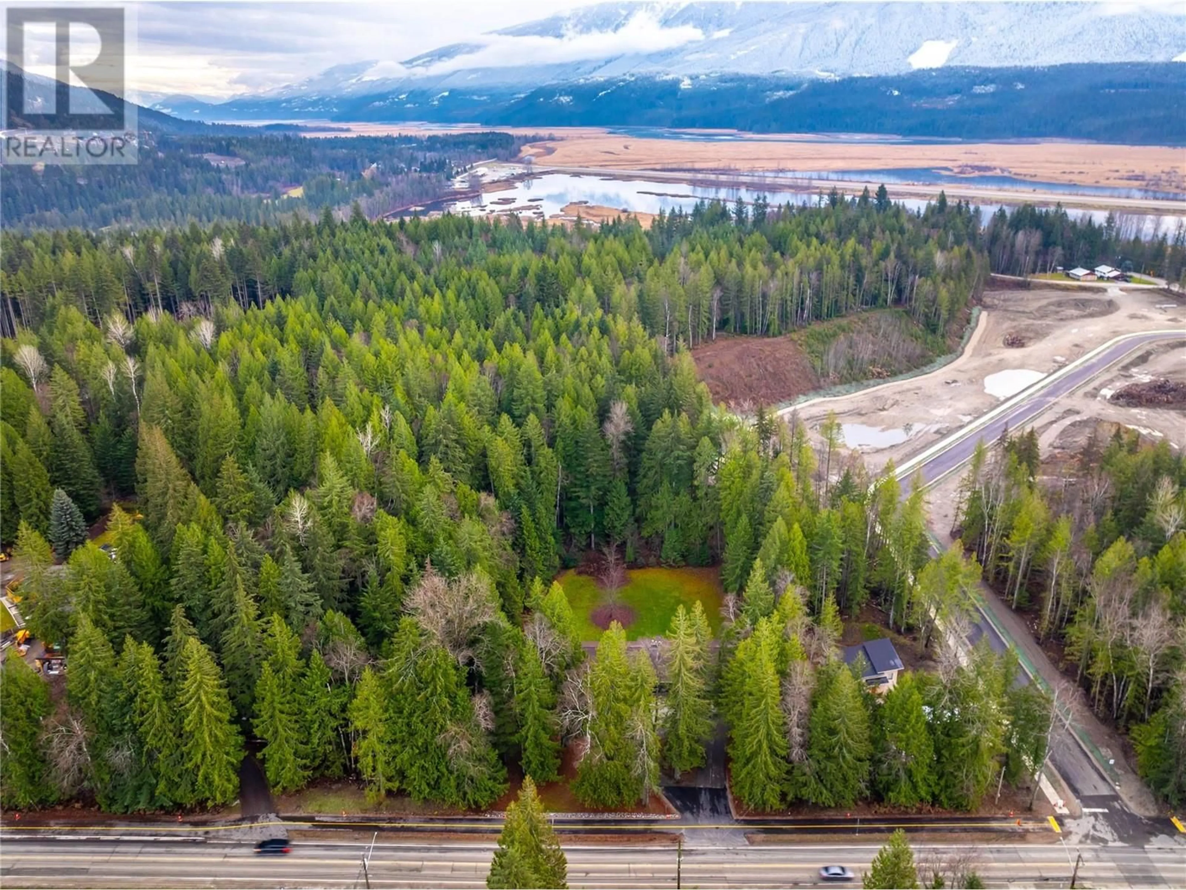 A pic from exterior of the house or condo, forest for 1557 Nichol Road, Revelstoke British Columbia V0E2S1