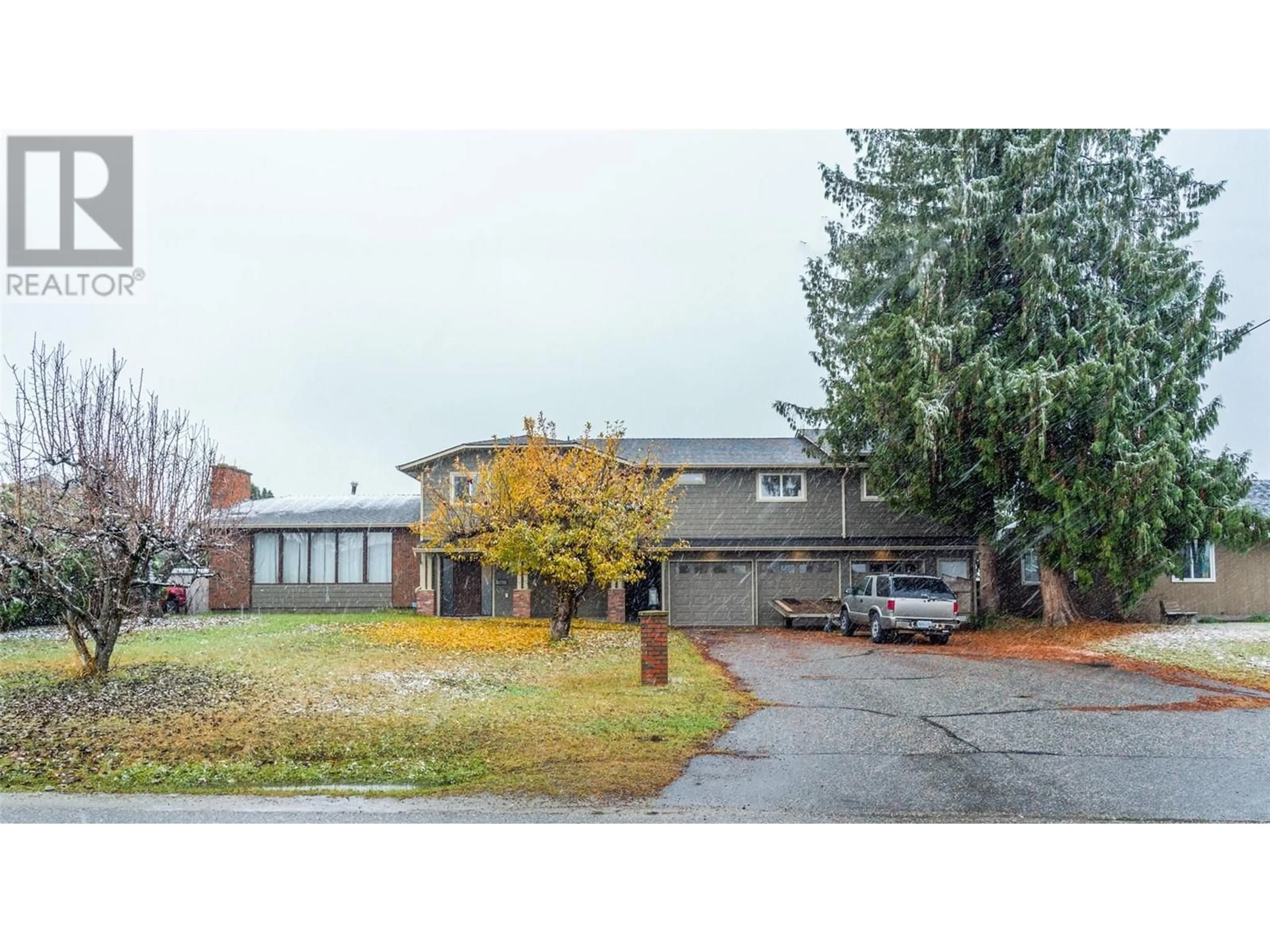 A pic from outside/outdoor area/front of a property/back of a property/a pic from drone, street for 2308 THACKER DRIVE, West Kelowna British Columbia V1Z1V7
