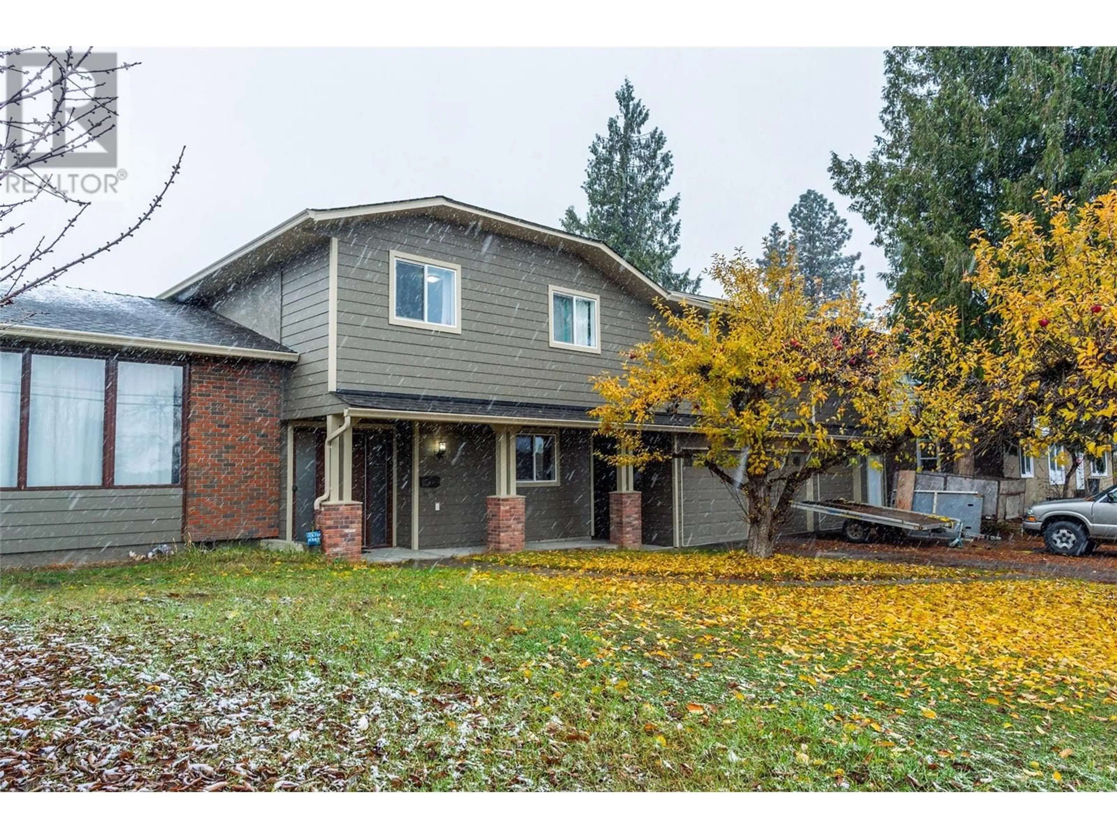 Frontside or backside of a home, the fenced backyard for 2308 Thacker Drive, West Kelowna British Columbia V1Z1V7