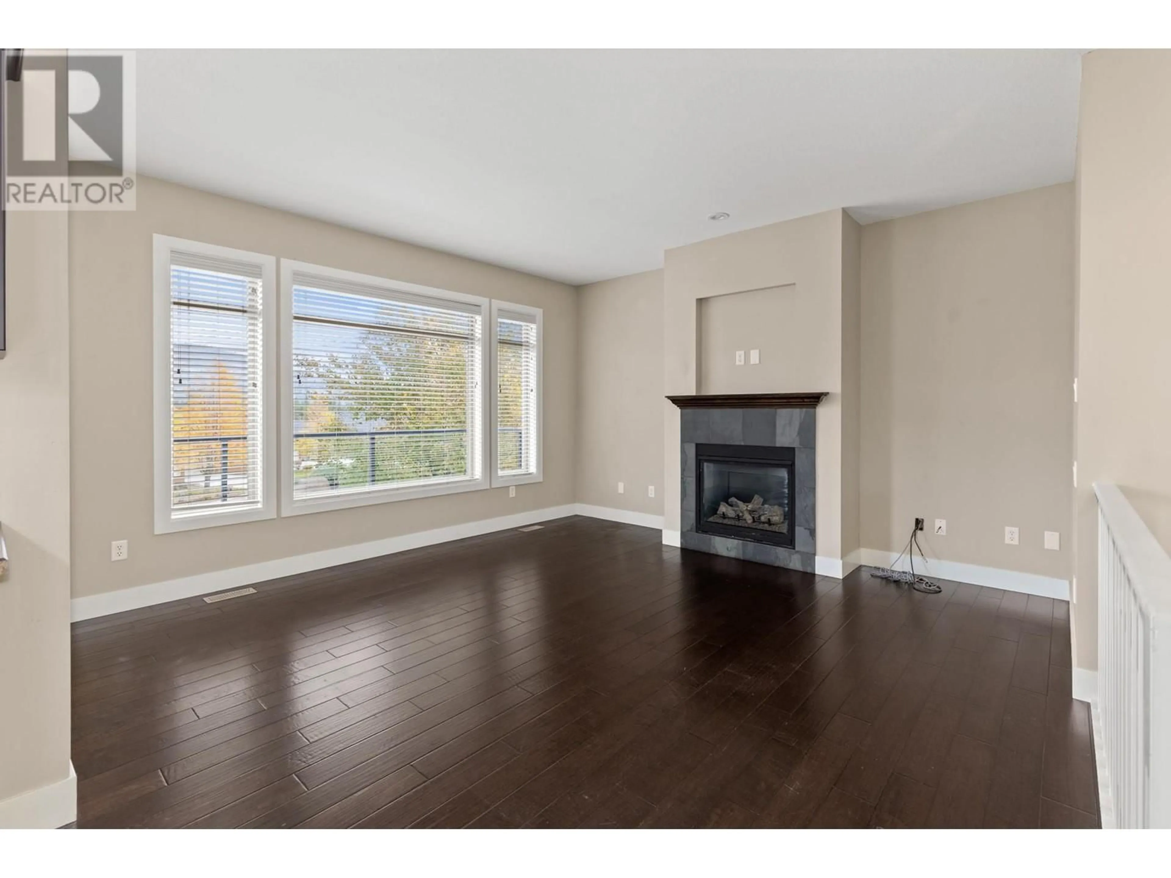 Living room, wood floors for 2165 Serrento Lane, West Kelowna British Columbia V4T3G3