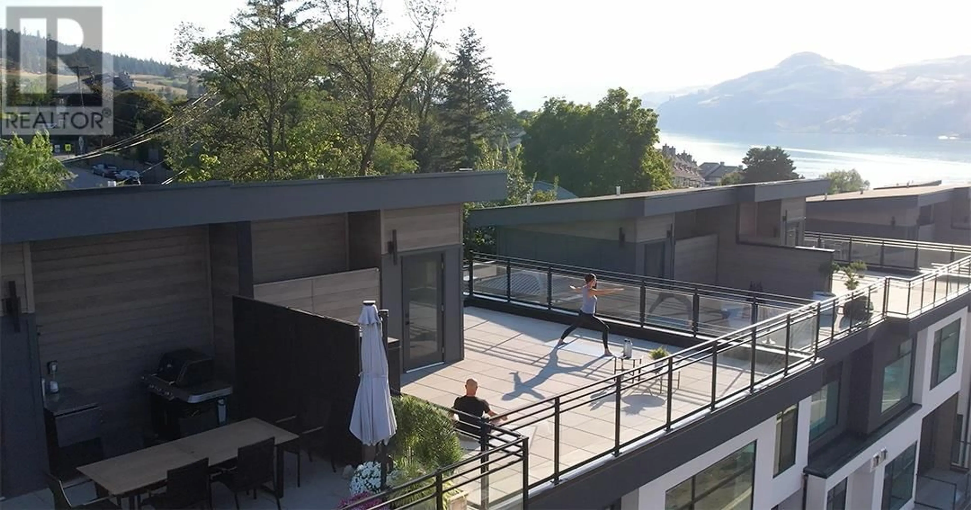 Patio, city buildings view from balcony for 16 - 7920 KIDSTON ROAD, Coldstream British Columbia V1B0B4