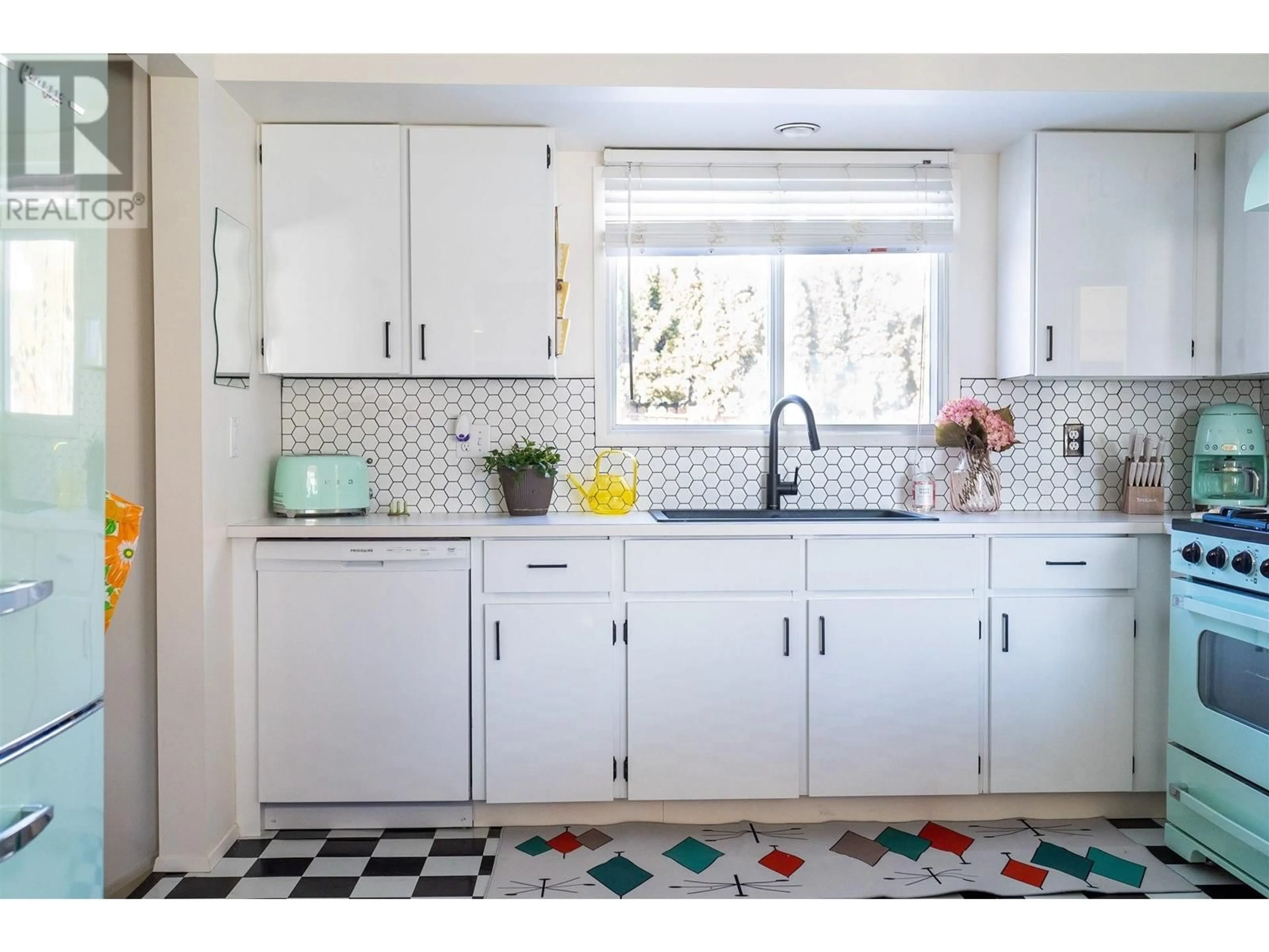 Kitchen, ceramic floors for 1738 Smithson Drive, Kelowna British Columbia V1Y4E3