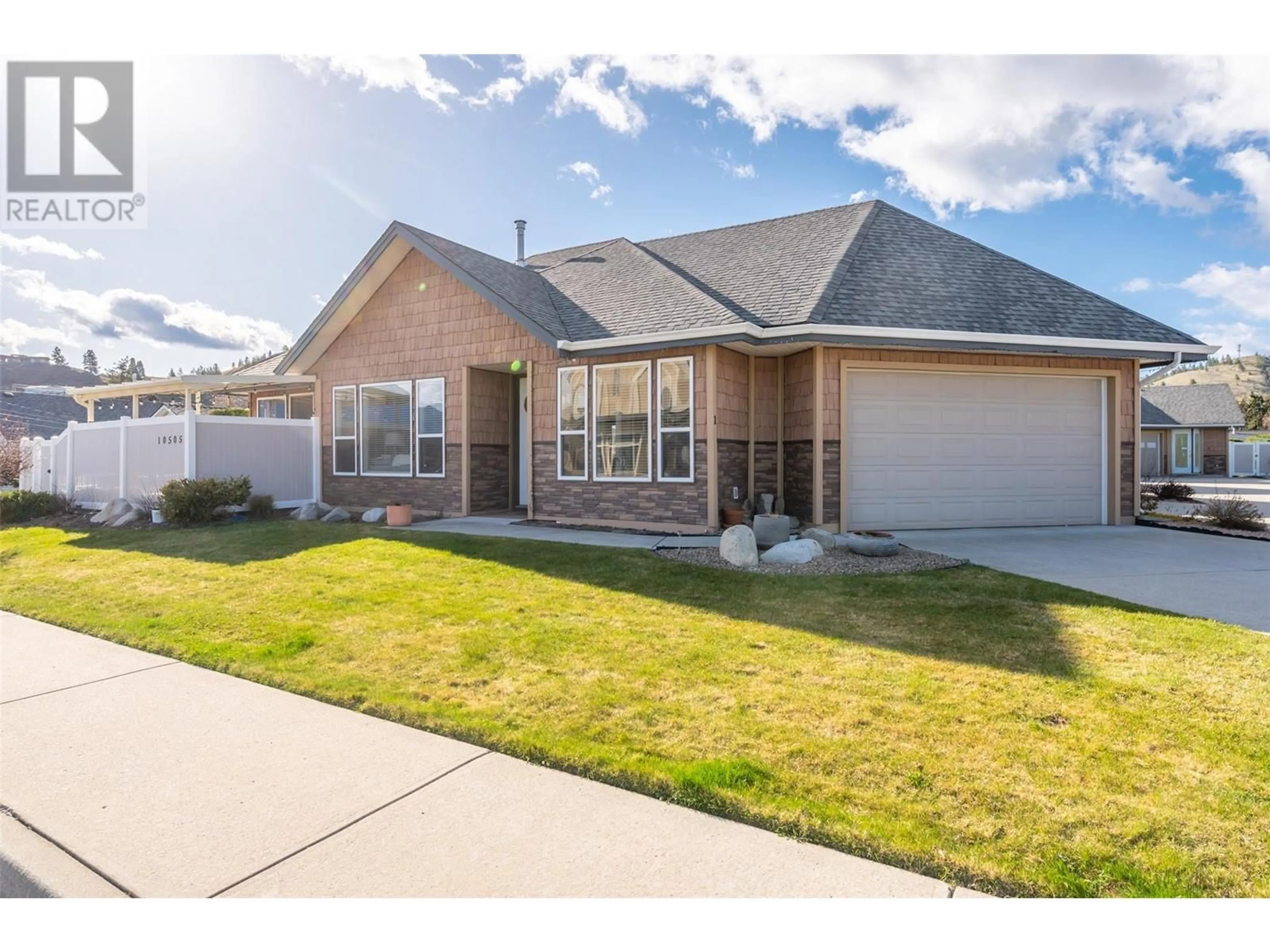 Frontside or backside of a home, the street view for 10505 Elliott St Unit# 1, Summerland British Columbia V0H1Z2