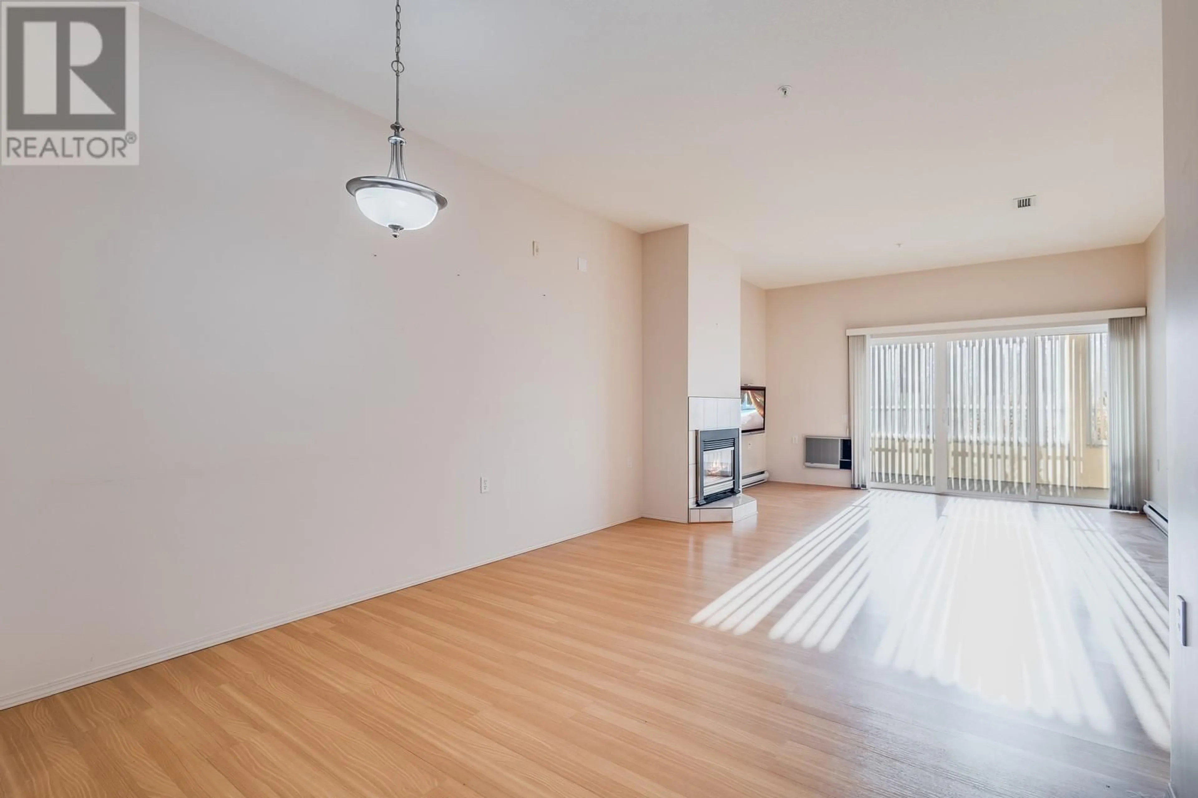 A pic of a room, wood floors for 920 Saskatoon Road Unit# 119, Kelowna British Columbia V1X7P8