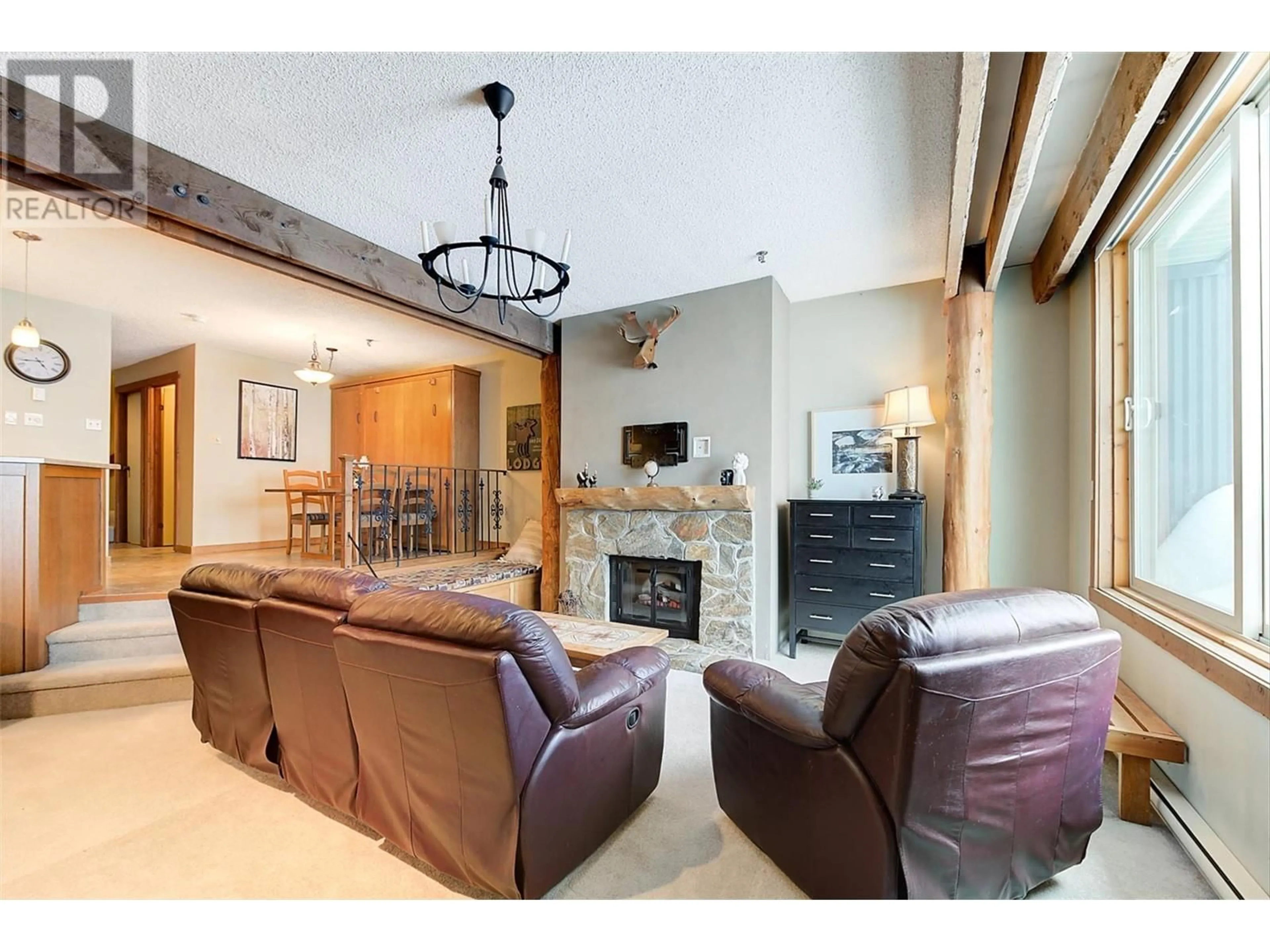Living room with furniture, unknown for 402 - 7470 PORCUPINE ROAD, Big White British Columbia V1P1P3
