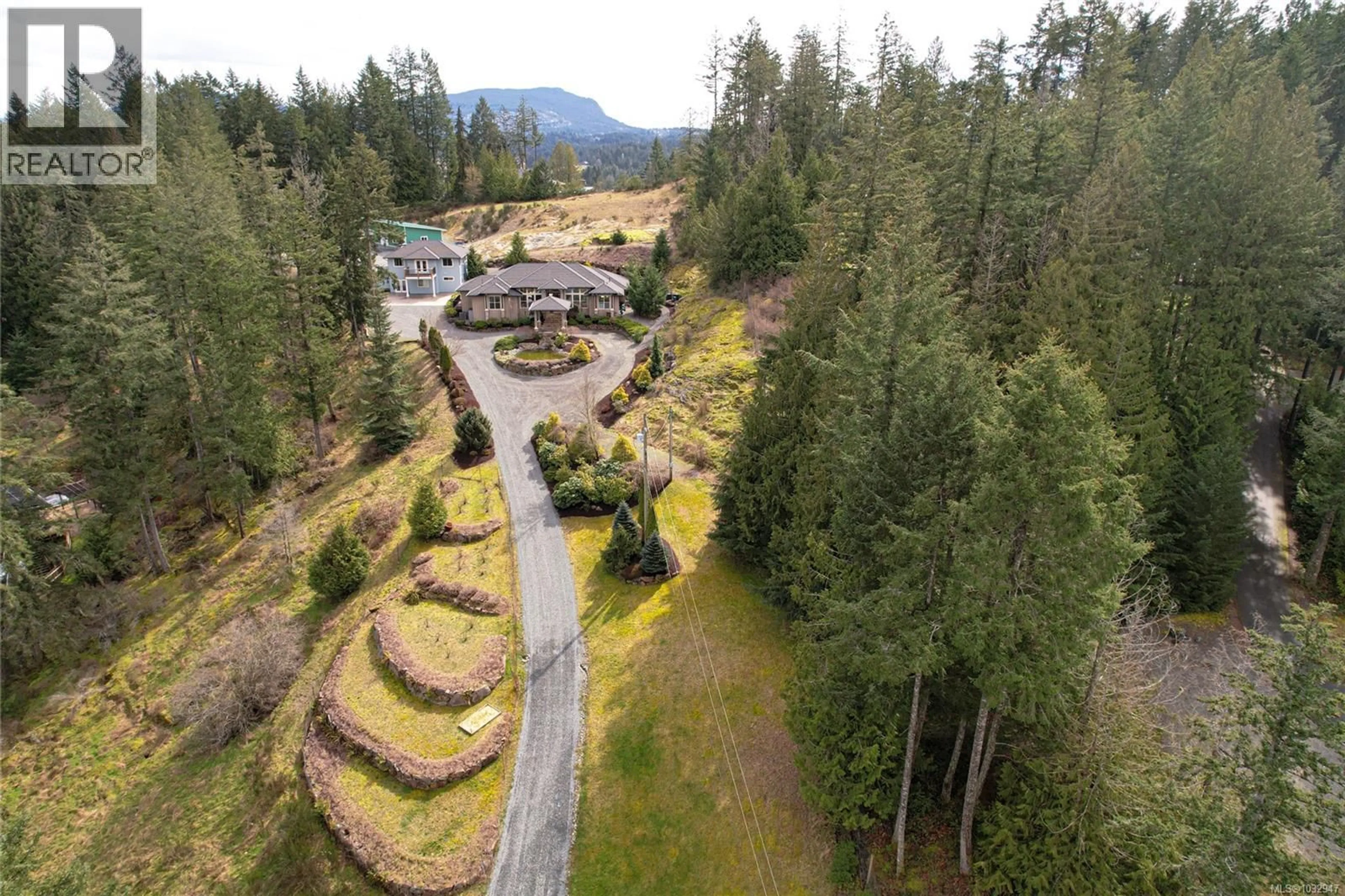 A pic from outside/outdoor area/front of a property/back of a property/a pic from drone, mountain view for 7487 RELKE ROAD, Duncan British Columbia V9L6A7