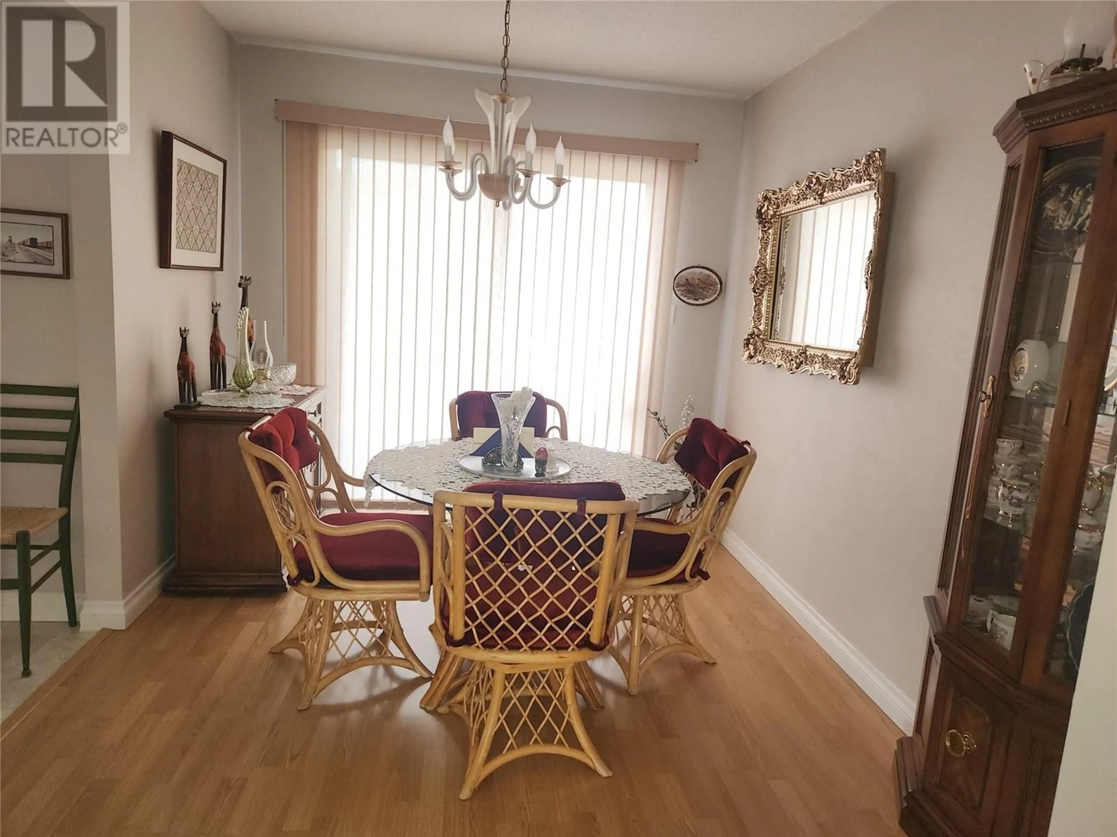 Dining room, wood/laminate floor for 36 Finch Crescent, Osoyoos British Columbia V0H1V0