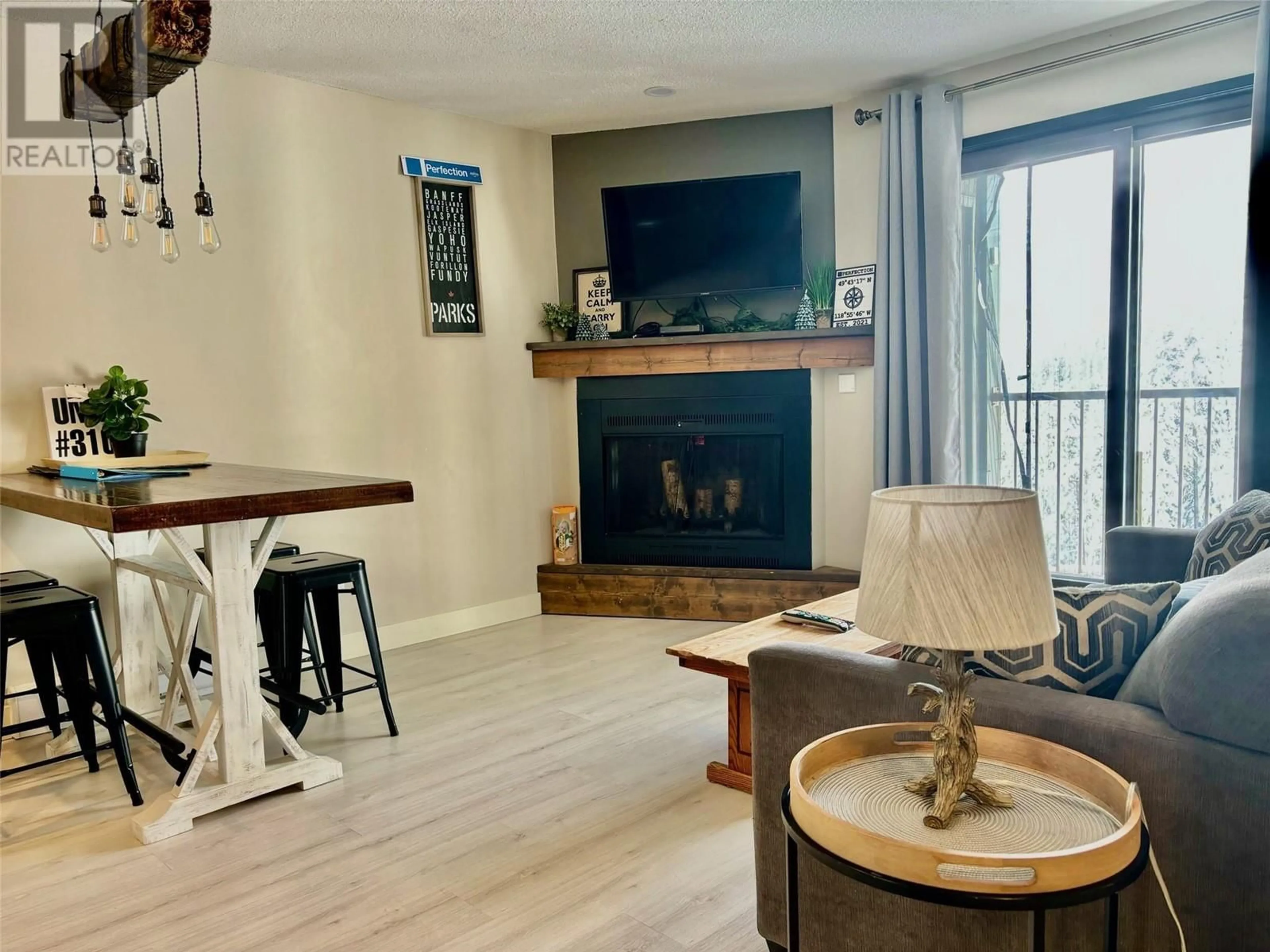 Living room, wood floors for 20 Kettleview Road Unit# 310, Big White British Columbia V1P1P3