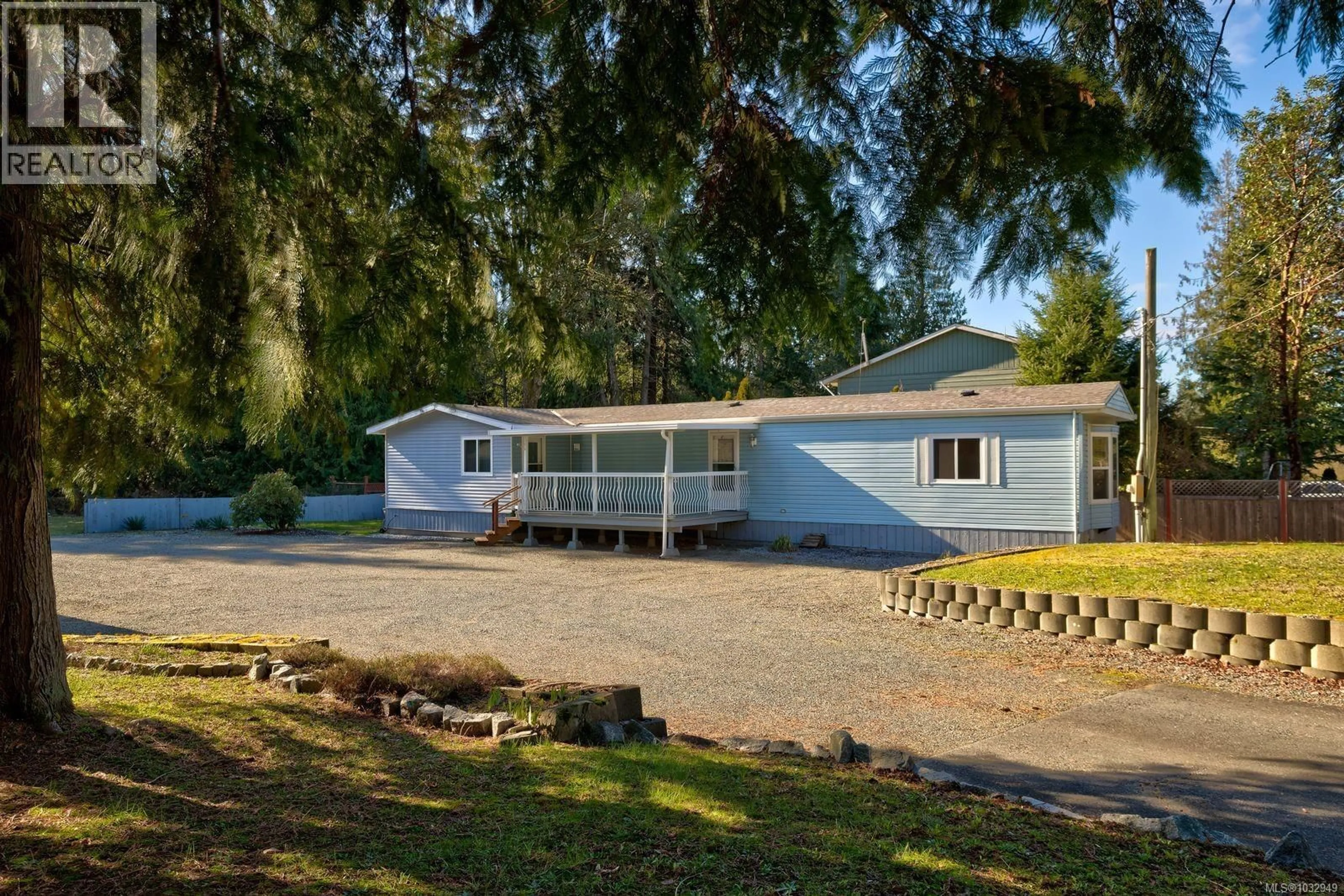 A pic from outside/outdoor area/front of a property/back of a property/a pic from drone, unknown for 7079 BLACKJACK DRIVE, Lantzville British Columbia V0R2H0