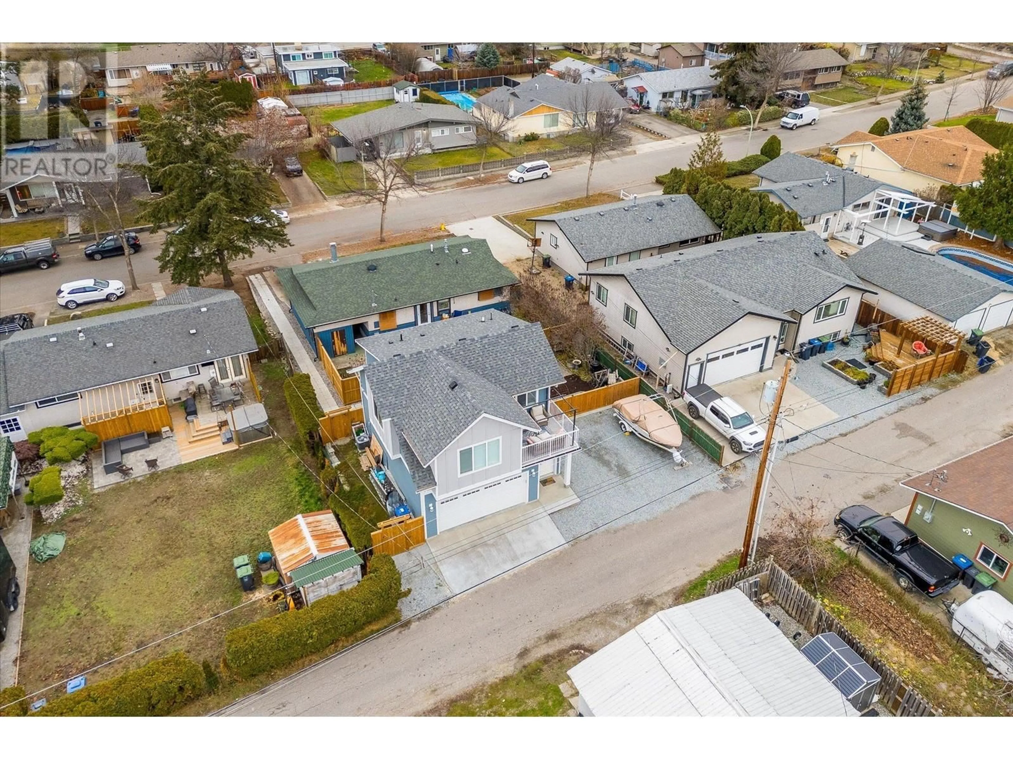 A pic from outside/outdoor area/front of a property/back of a property/a pic from drone, street for 1400-1404 BRAEMAR STREET, Kelowna British Columbia V1Y3X3