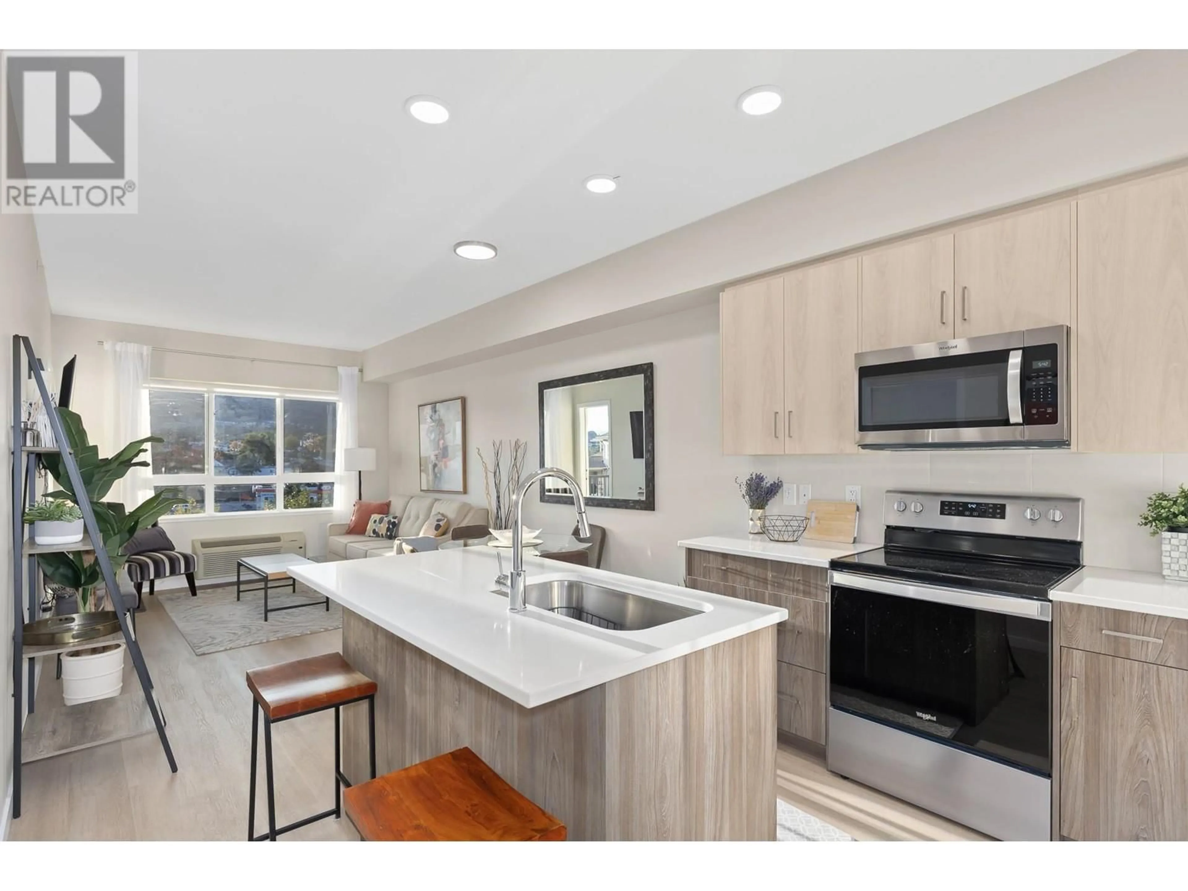 Open concept kitchen for 2301 Carrington Road Unit# 404, West Kelowna British Columbia V4T3K8