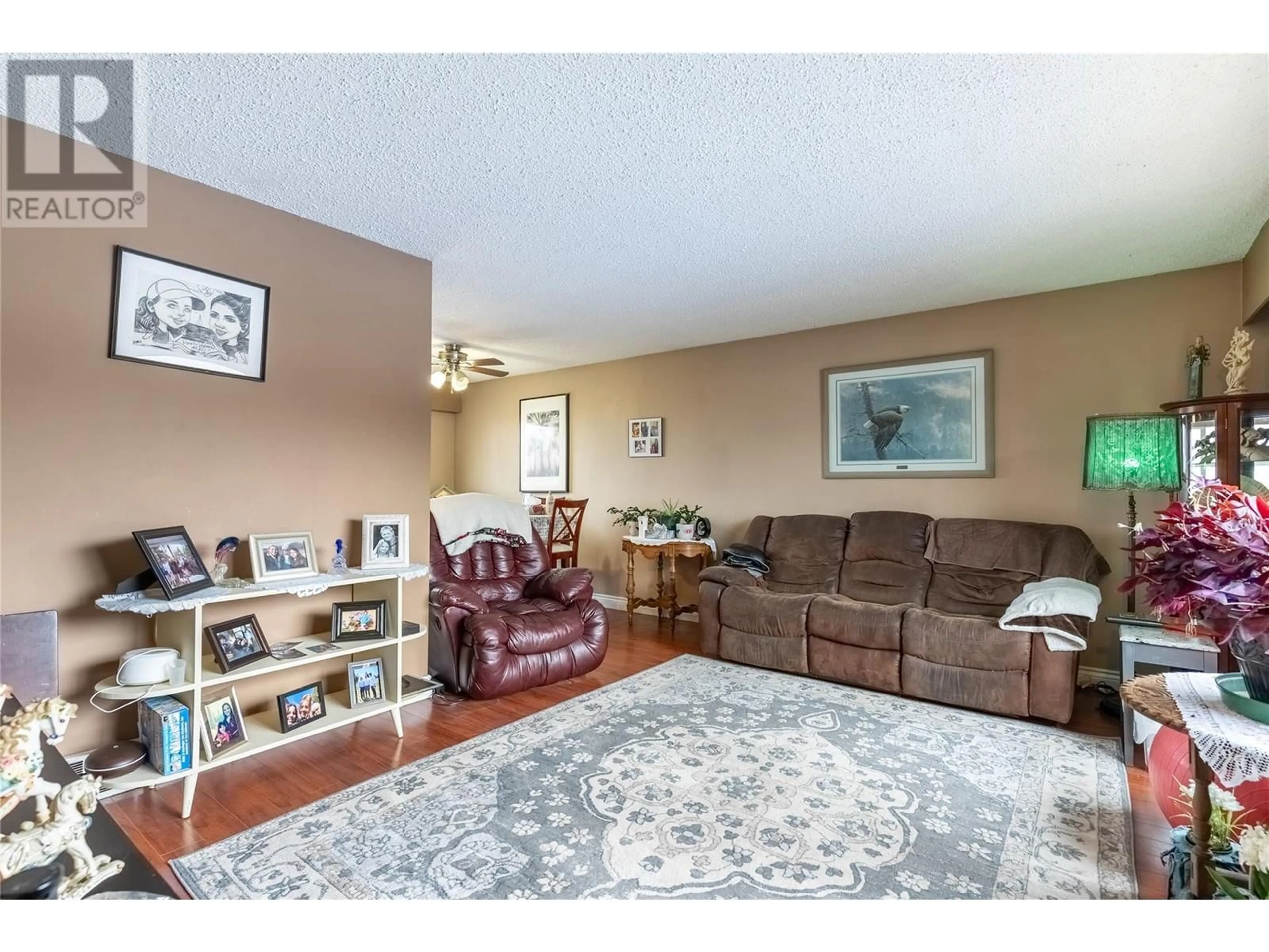 Living room, wood floors for 1105 Maclean Crescent, Cache Creek British Columbia V0K1H0